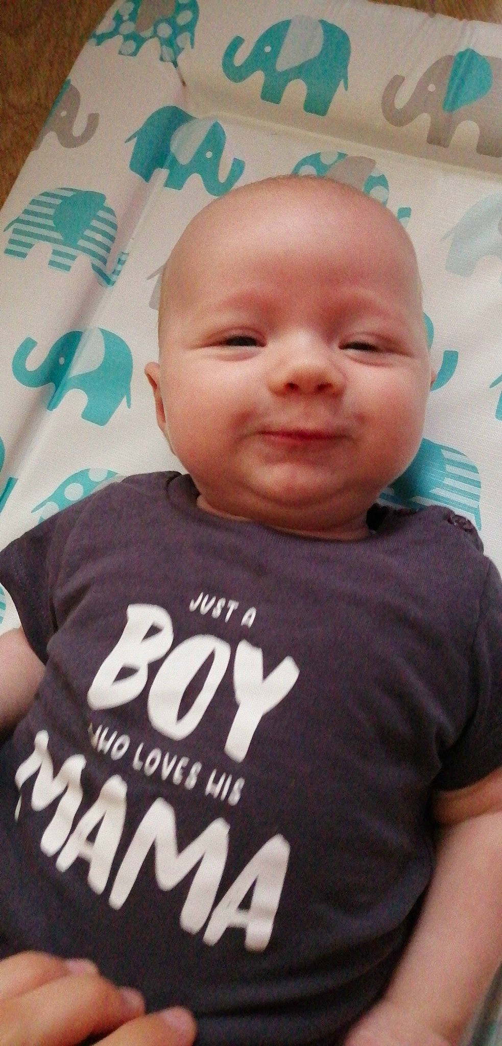 Oslo is registered to the contest to win money with this photo: active_shirt, baby, baby_toddler_clothing, cheek, chin, cool, eyebrow, finger, forehead, fun, happy, head, mouth, neck, nose, person, skin, sleeve, smile, t_shirt