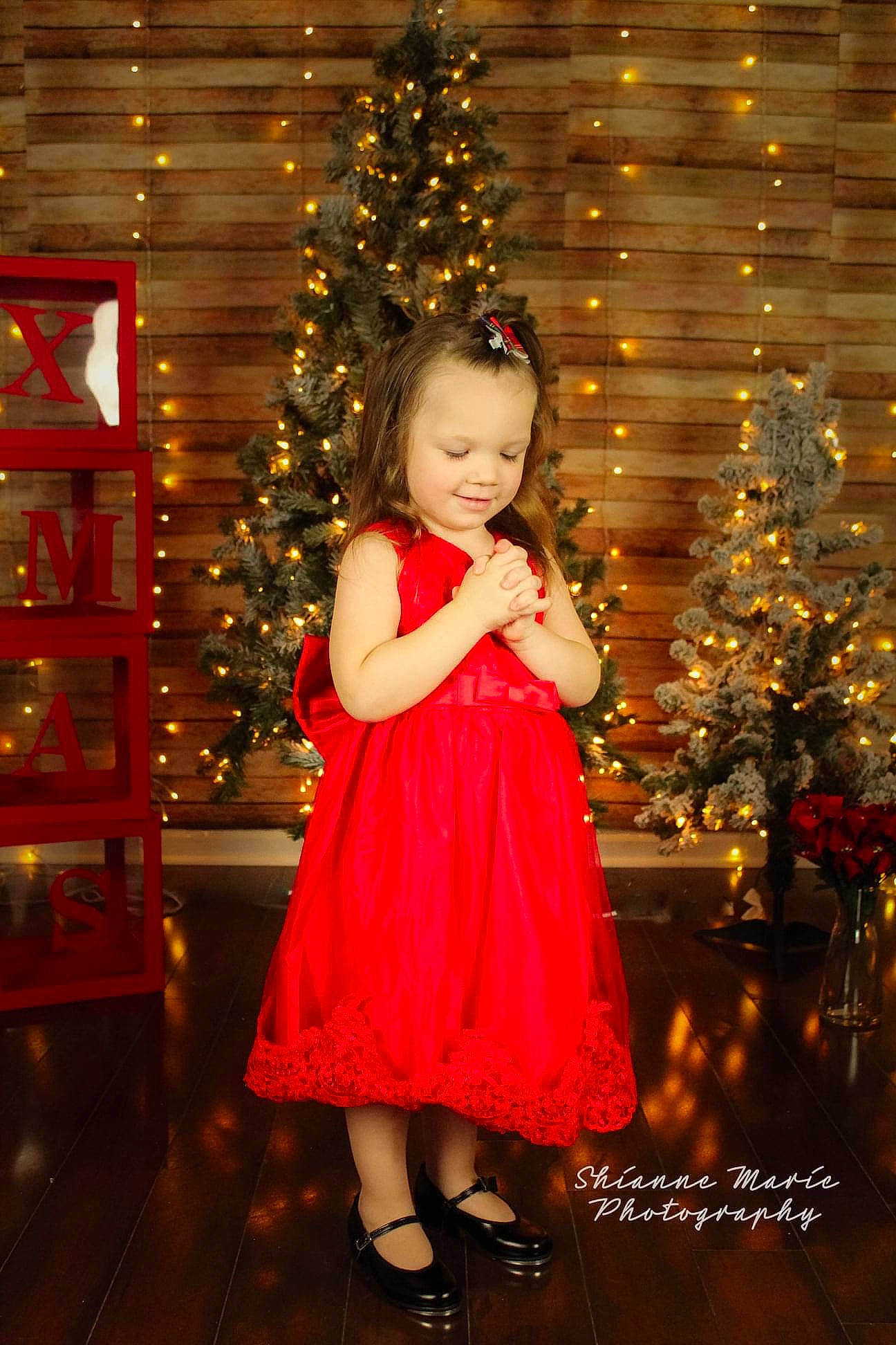 Emmie joined the competition — help win amazing prizes! baby_toddler_clothing, christmas_decoration, christmas_ornament, christmas_tree, dress, event, evergreen, formal_wear, fun, happy, holiday, holiday_ornament, joy, magenta, one_piece_garment, ornament, people_in_nature, person, standing, toddler