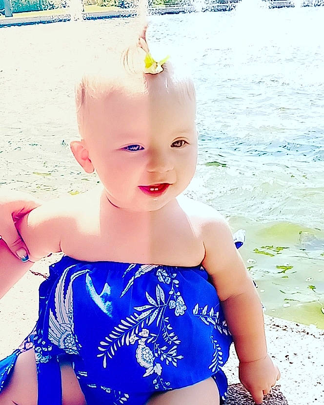 Anastasia participe au concours pour gagner de l'argent avec cette photo : child, clothing, fun, happy, maillot, one_piece_swimsuit, person, play, smile, summer, sunlight, swimwear, toddler, vacation