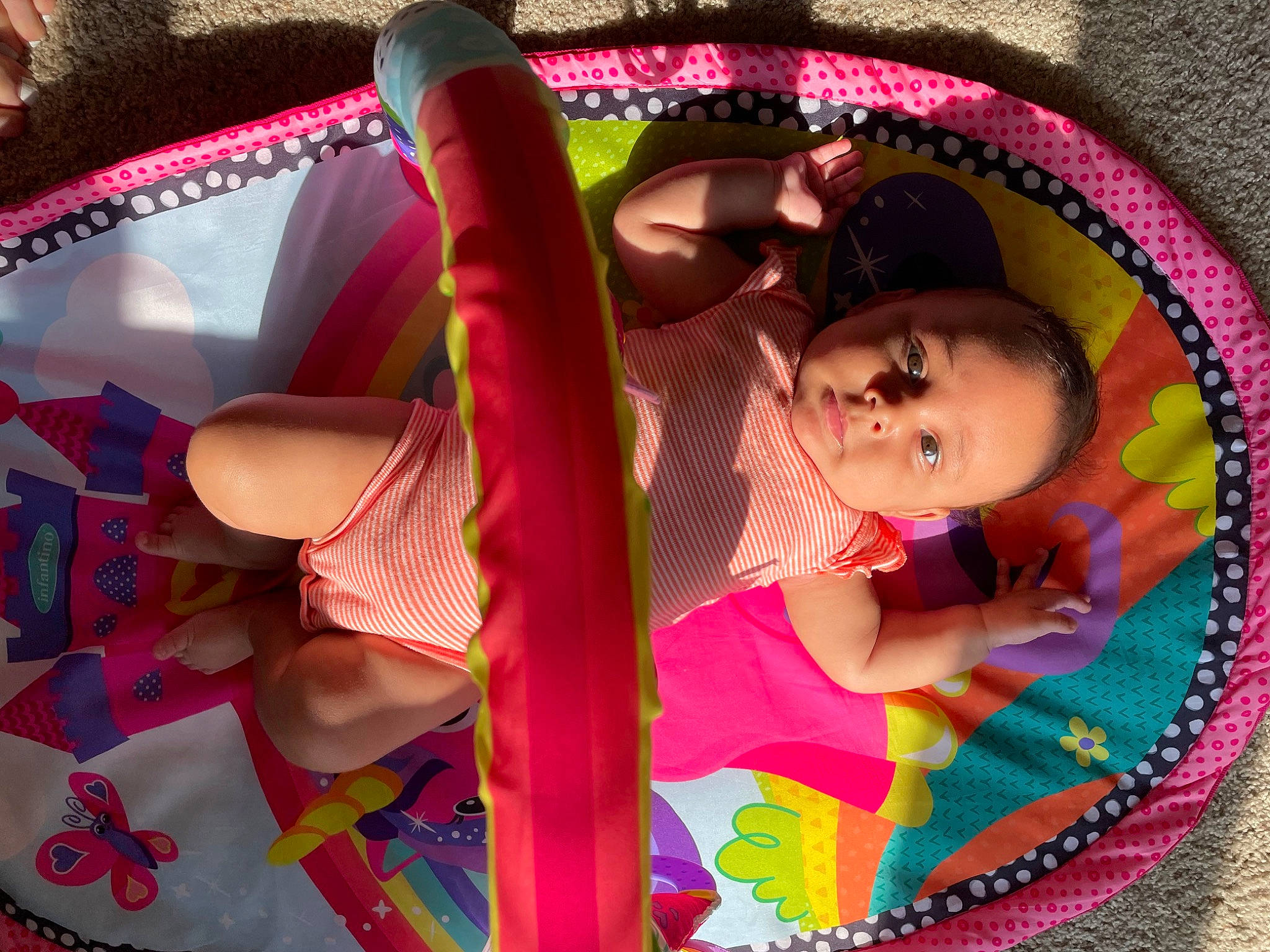 Maylani is registered to the contest to win money with this photo: audio_equipment, auto_part, baby_products, car_seat, child, fun, happy, leisure, magenta, pattern, person, picture_frame, pink, play, recreation, textile, toddler, toy, trunk, vehicle_door
