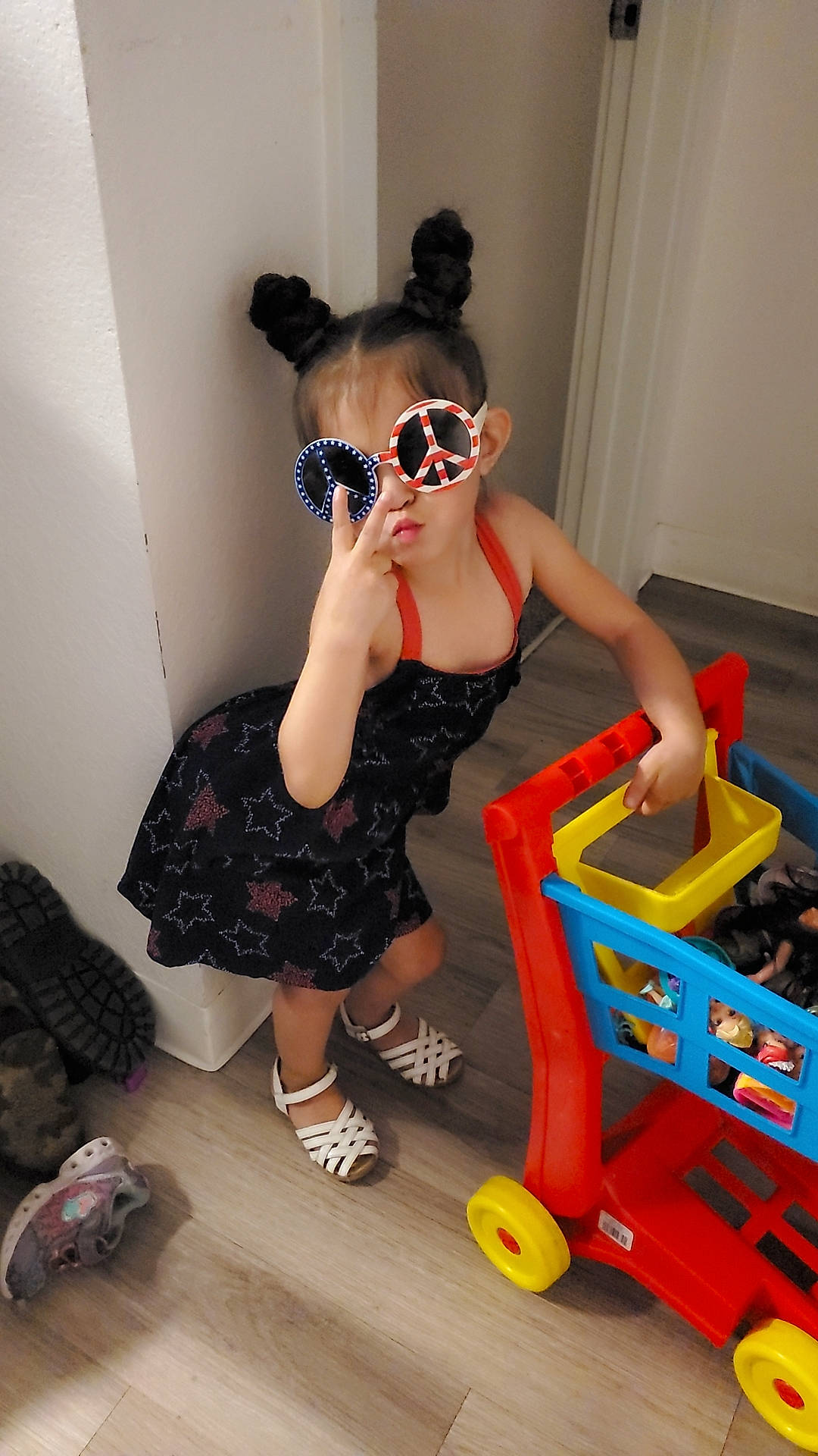 Arianni joined the competition — help win amazing prizes! child, dress, eyewear, fashion_design, flooring, fun, glasses, goggles, human_leg, leisure, pattern, person, personal_protective_equipment, room, sitting, sunglasses, thigh, tire, vision_care, waist