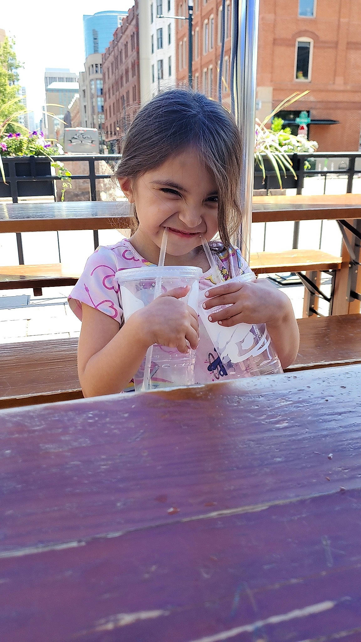 Arianni joined the competition — help win amazing prizes! bangs, building, child, finger, hair, happy, hardwood, houseplant, joy, leisure, outdoor_furniture, person, plant, sitting, smile, table, thumb, toddler, travel, vacation