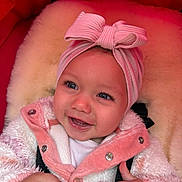 Cataleya joined the competition — help win amazing prizes! baby, child, smiling, headband, bow, jacket, pink, white, cozy, warm, fluffy, happy, cute, infant, closeup, portrait, hands, indoors, face, apparel