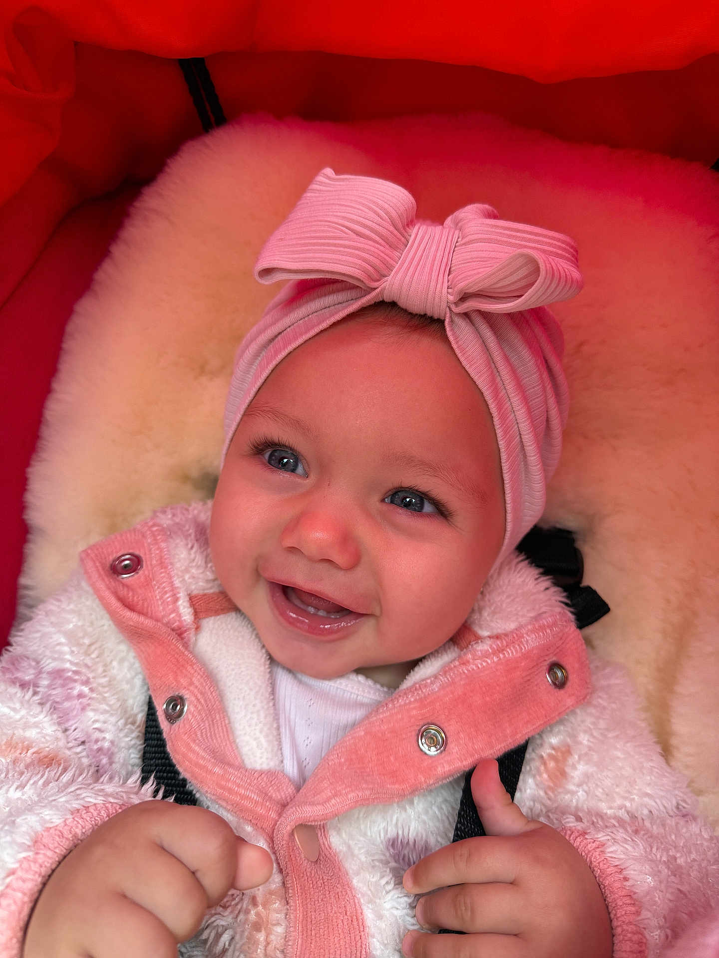 Cataleya joined the competition — help win amazing prizes! baby, child, smiling, headband, bow, jacket, pink, white, cozy, warm, fluffy, happy, cute, infant, closeup, portrait, hands, indoors, face, apparel