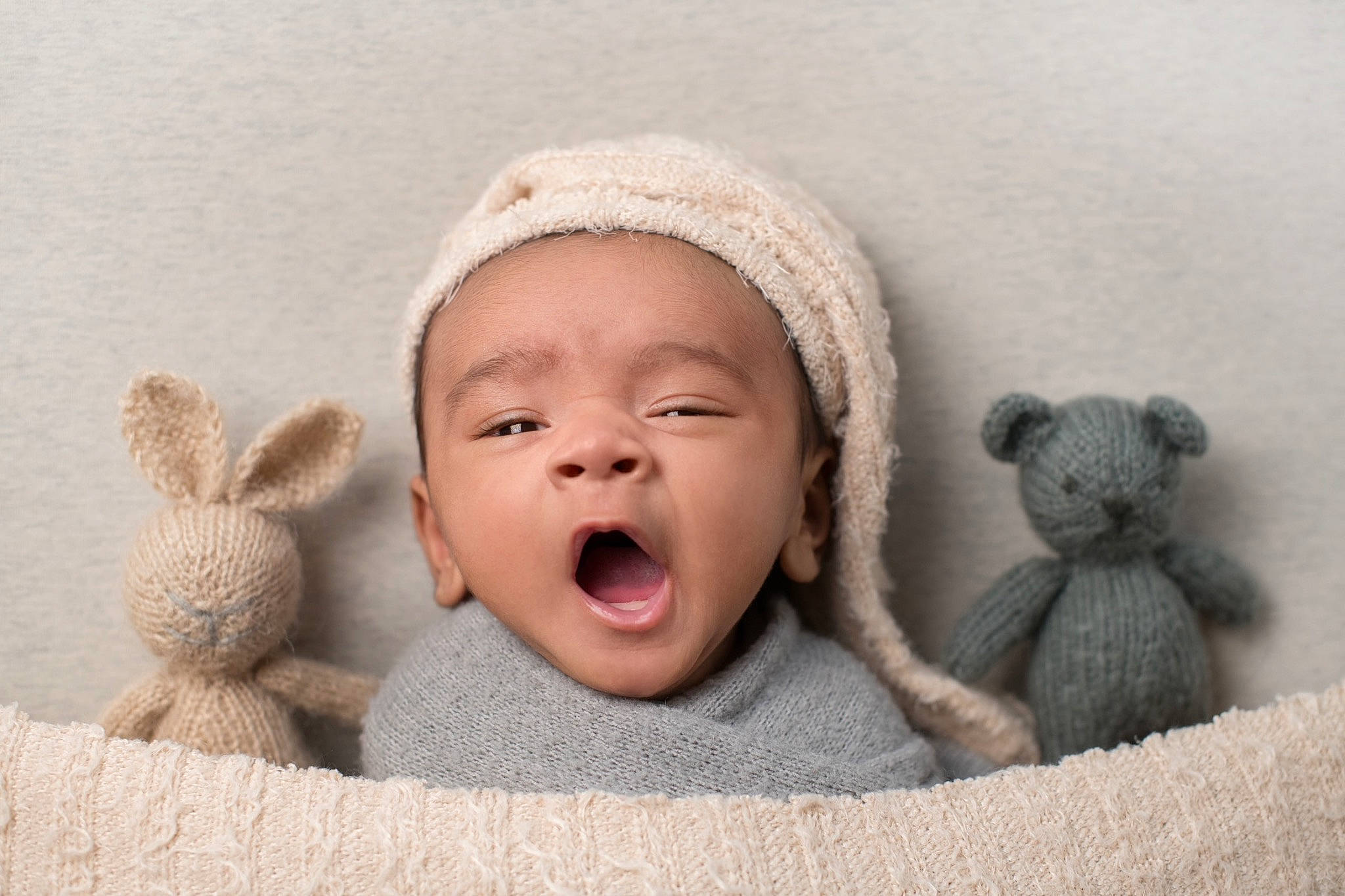 Shlok is registered to the contest to win money with this photo: baby, baby_sleeping, baby_toddler_clothing, cap, child, comfort, ear, finger, fur, gesture, happy, headgear, linens, nose, person, skin, smile, stuffed_toy, toddler, toy
