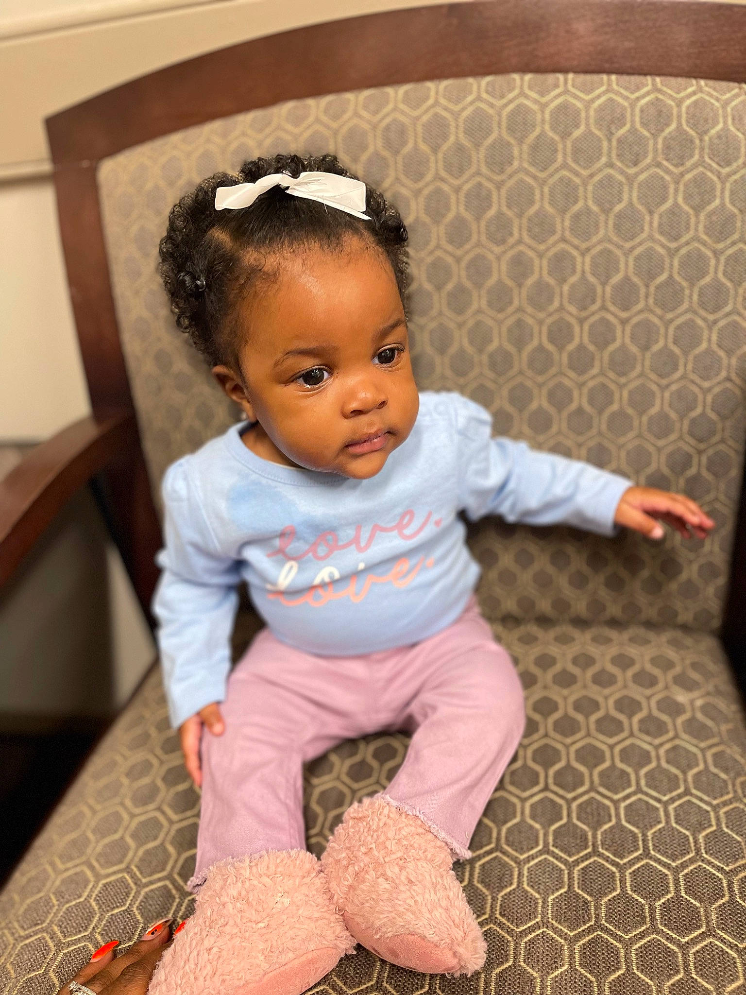 Danni is registered to the contest to win money with this photo: baby, baby_toddler_clothing, baby_toys, cheek, child, eye, floor, flooring, happy, hardwood, headband, pattern, peach, person, pink, sitting, skin, sleeve, sock, toddler