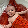 arm, baby, bath, bathtub, child, cute, eyes, face, hand, indoors, infant, newborn, orange, portrait, relax, skin, smile, towel, water, wet