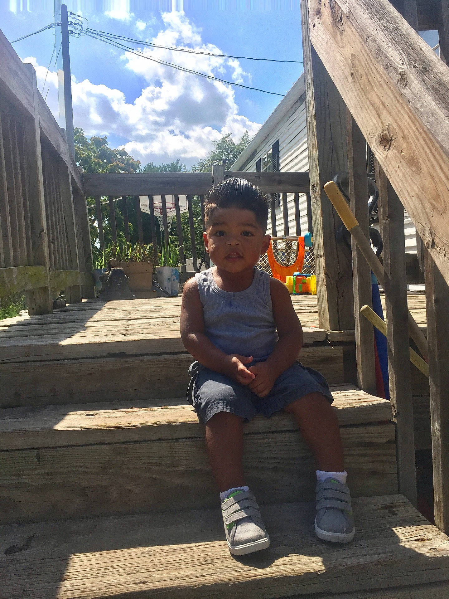 Eduardo joined the competition — help win amazing prizes! boy, child, day, fun, girl, house, leisure, male, person, public_space, recreation, road, sitting, smile, street, temple, tourism, travel, tree, vacation