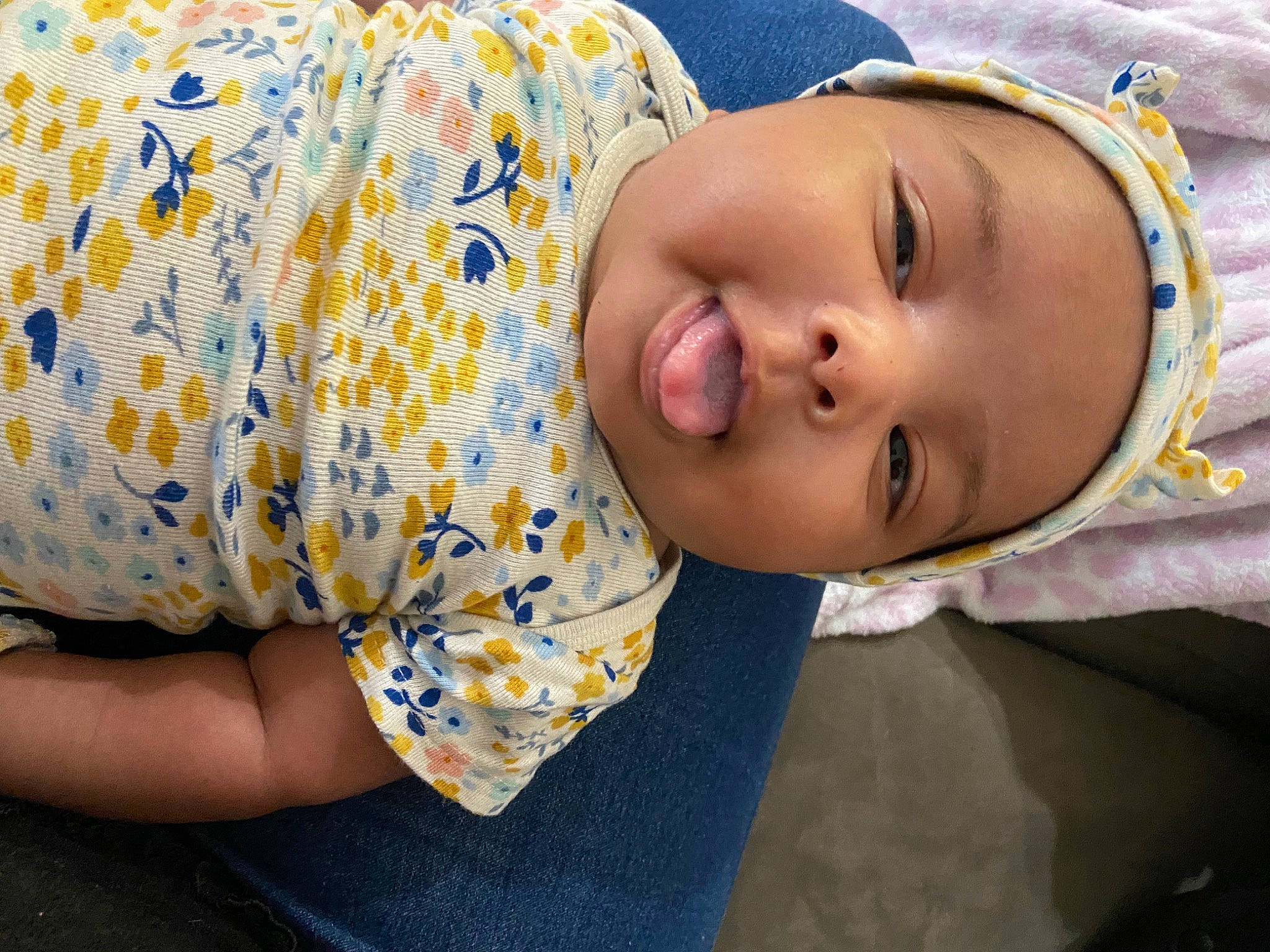 Liliana is registered to the contest to win money with this photo: baby, baby_toddler_clothing, cheek, child, comfort, elbow, fun, grass, happy, headwear, human_body, iris, lip, mouth, neck, nose, pattern, person, skin, sleeve