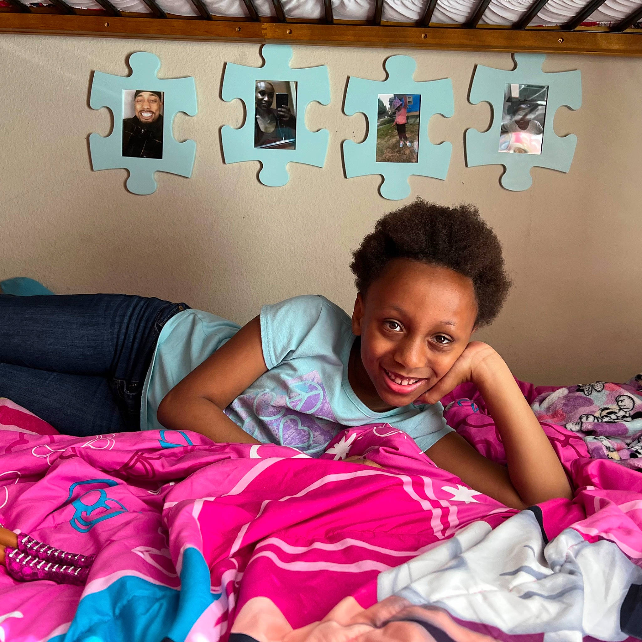 Iris joined the competition — help win amazing prizes! black_hair, child, comfort, cool, event, fun, happy, headwear, joy, leisure, linens, magenta, people, person, picture_frame, pillow, pink, purple, room, smile