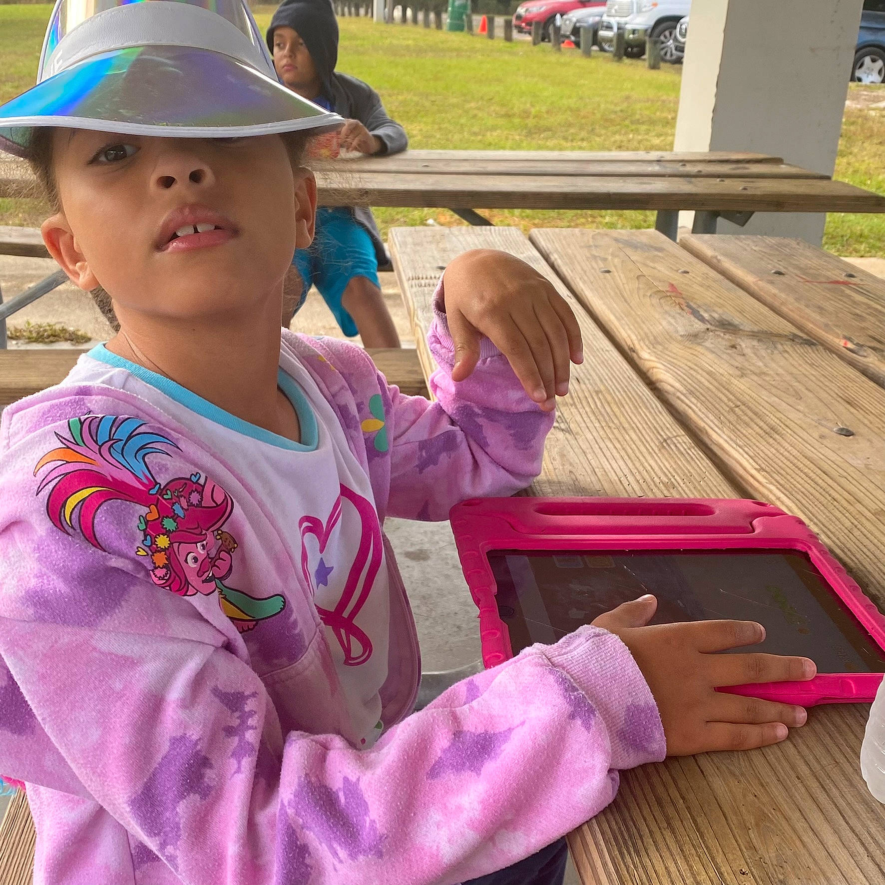 Mykayla is registered to the contest to win money with this photo: baseball_cap, cap, child, event, fun, grass, happy, hat, headwear, leisure, magenta, person, pink, play, recreation, sleeve, sun_hat, t_shirt, tire, toddler