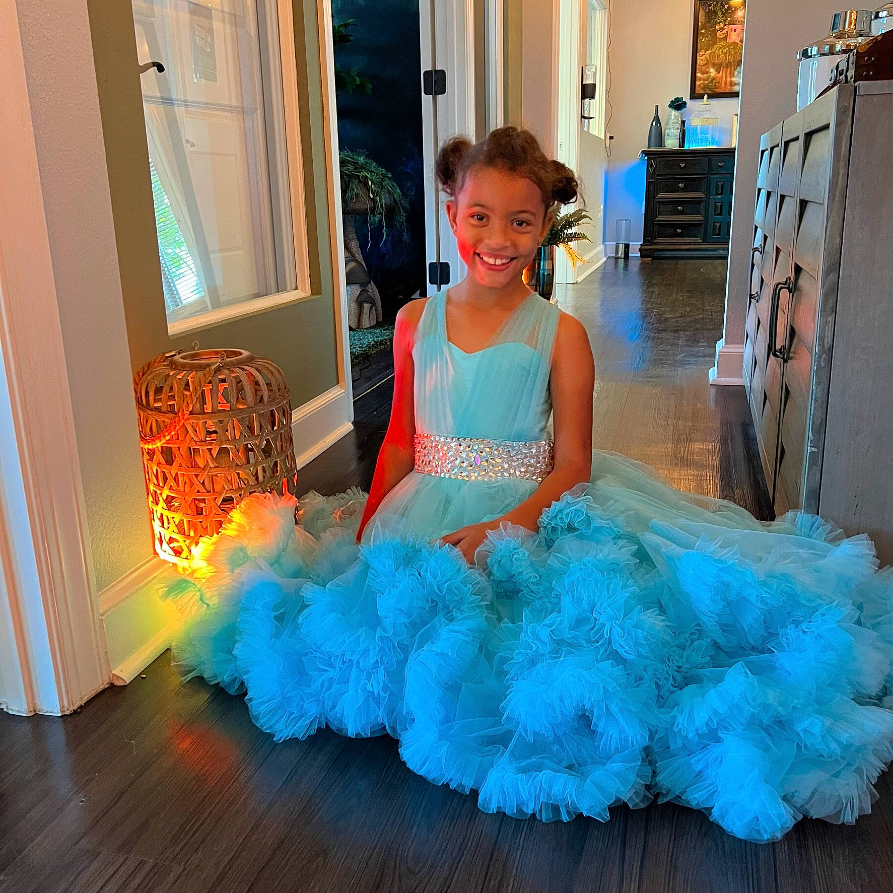 Mykayla is registered to the contest to win money with this photo: aqua, azure, ballet_tutu, child, cocktail_dress, day_dress, electric_blue, event, fashion_accessory, fashion_design, flooring, formal_wear, fun, gown, happy, joy, person, ruffle, shoulder, smile