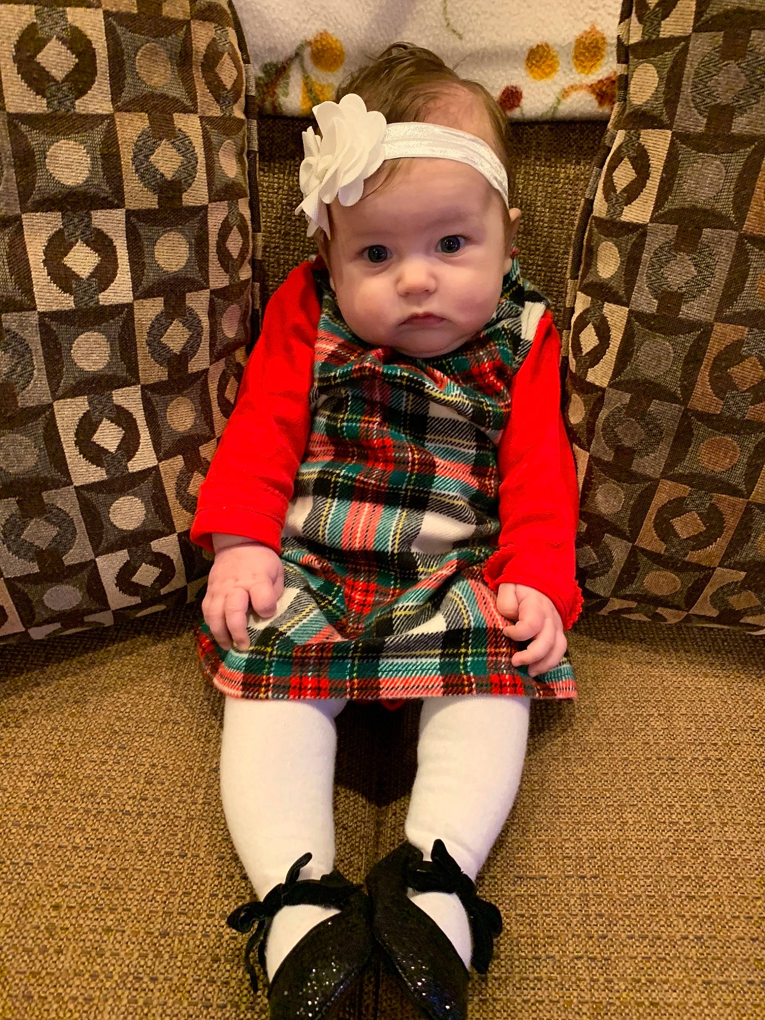 Leighla is registered to the contest to win money with this photo: child, christmas, design, girl, headgear, headwear, holiday, infant, outerwear, pattern, person, plaid, product, skin, tartan, textile, toddler