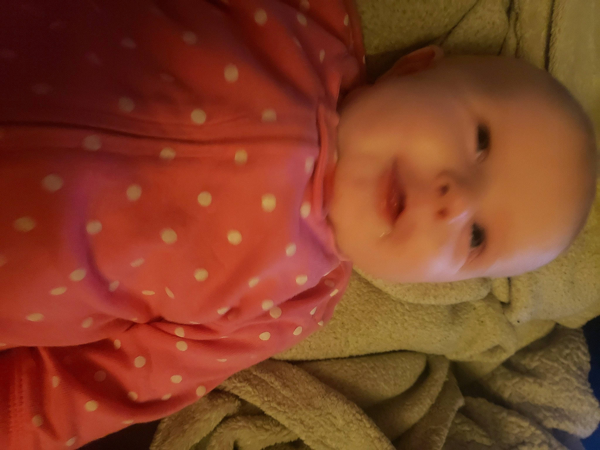 Kaia is registered to the contest to win money with this photo: baby, baby_toddler_clothing, cheek, chin, comfort, eye, eyebrow, finger, head, human_body, iris, lip, mammal, mouth, nose, person, product, skin, sleeve, textile