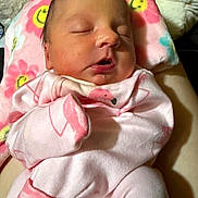 Elena joined the competition — help win amazing prizes! newborn, baby, sleeping, pink_clothing, flamingo_pattern, blanket, floral_pattern, infant, cozy, cute, soft, face, closed_eyes, resting, child, person, indoors, comfort, warmth, portrait