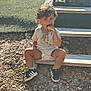 black_shoes, casual, child, curly_hair, cute, dirt, food, happy, ice_cream, messy, outdoor, playful, snack, sneakers, steps, summer, sunlight, toddler, white_shirt, wood