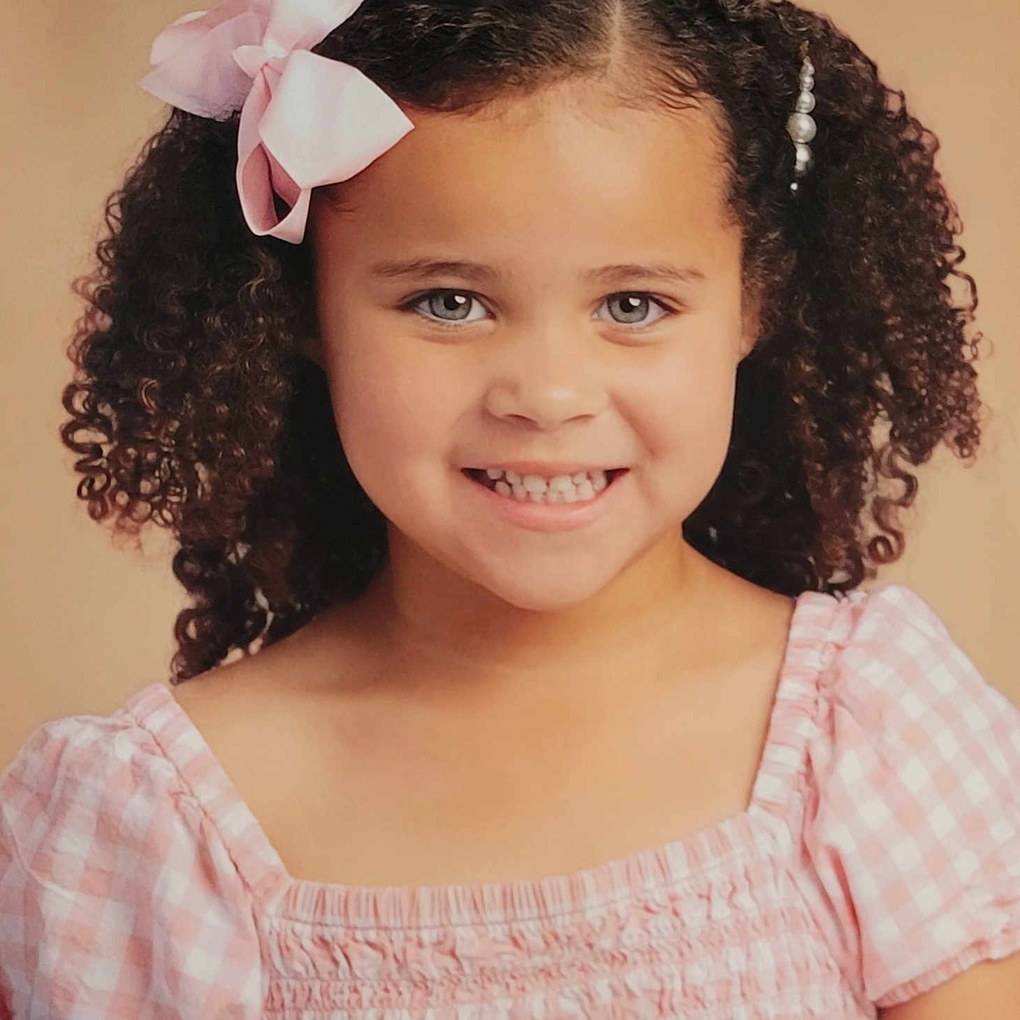 Luna is registered to the contest to win money with this photo: accessories, blackhair, bodypart, child, clothing, dimples, dress, face, female, girl, hair, happy, head, mouth, person, photography, portrait, shoulder, sleeve, smile