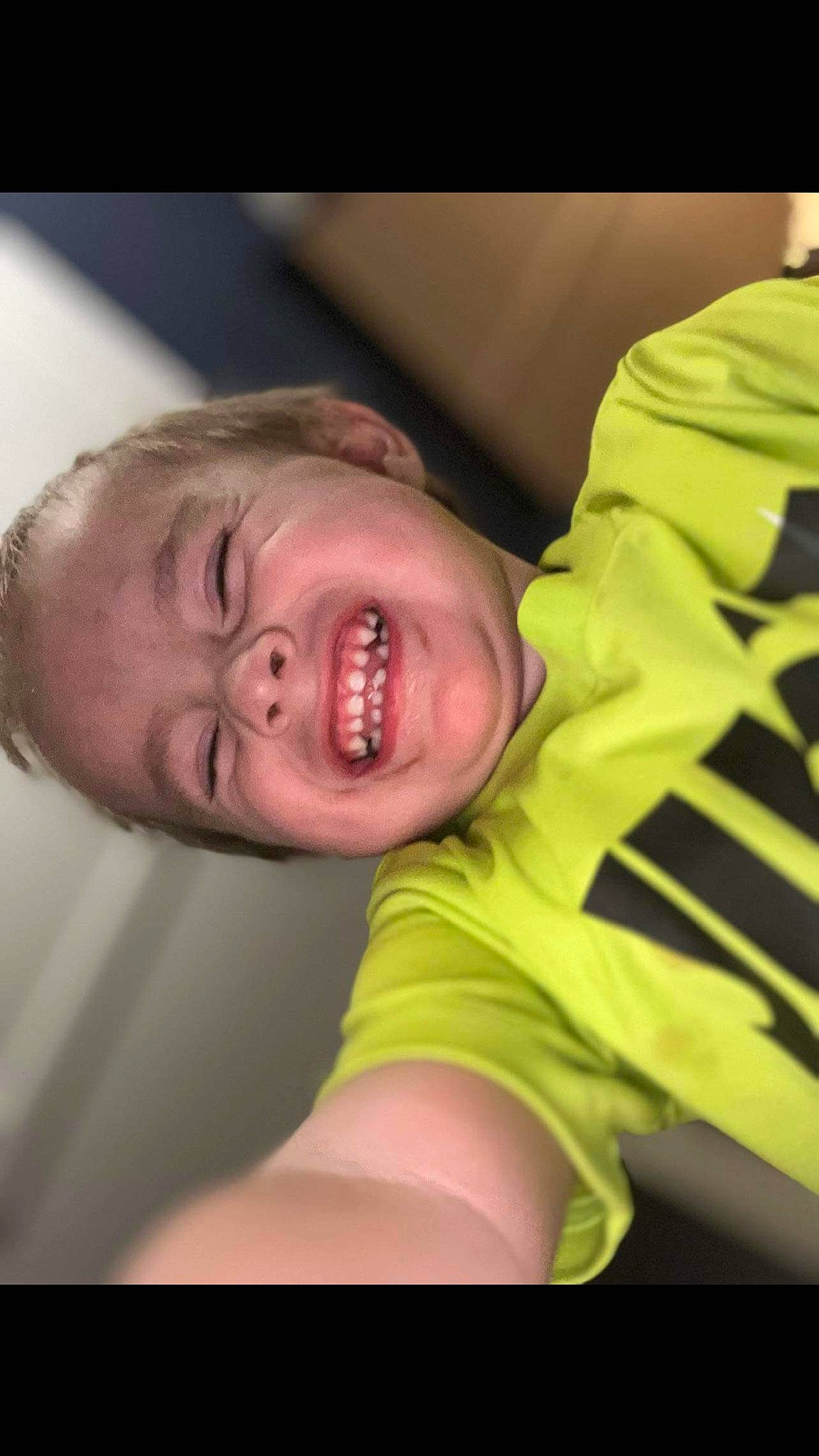 Juan is registered to the contest to win money with this photo: abdomen, baby, cheek, chest, comfort, elbow, eye, flash_photography, flesh, fun, gesture, happy, jaw, joy, laugh, nose, person, portrait_photography, sleeve, smile