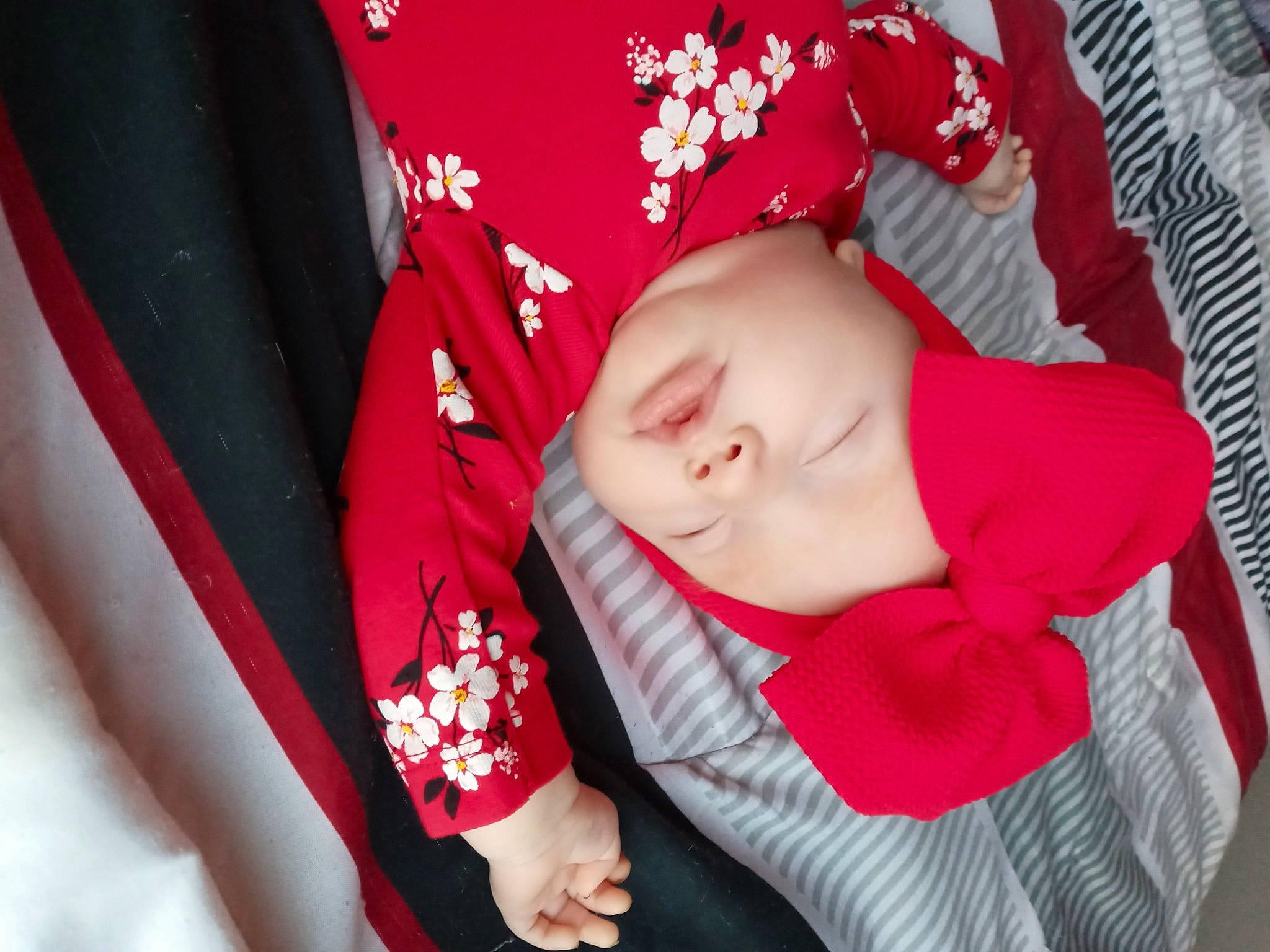 Kaisley joined the competition — help win amazing prizes! baby, baby_carriage, baby_products, baby_toddler_clothing, car_seat, carmine, child, comfort, fashion_accessory, gesture, lip, magenta, mouth, nail, pattern, person, pink, portrait_photography, sitting, sleeve