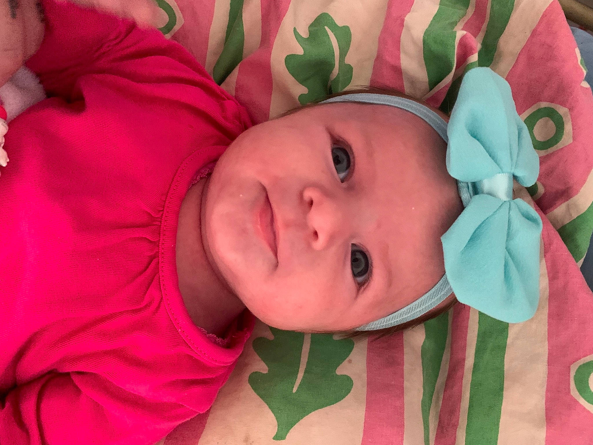 Adélaïde a rejoint le concours — aidez-le/la à gagner de superbes lots ! baby, baby_toddler_clothing, cheek, child, chin, eye, eyebrow, facial_expression, hat, head, headwear, iris, lip, mammal, nose, person, pink, skin, sleeve, textile