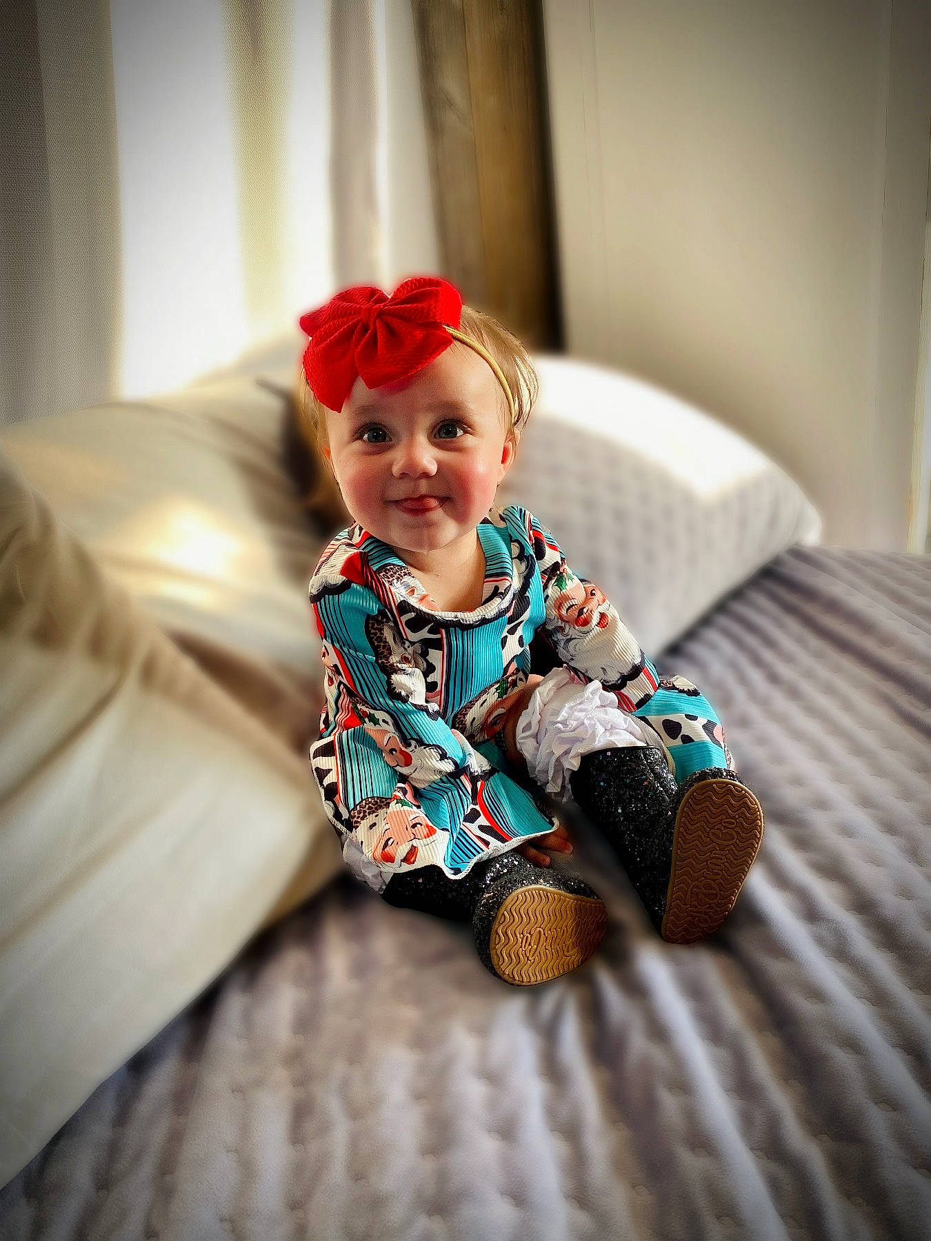 Kinslee joined the competition — help win amazing prizes! baby, baby_toddler_clothing, child, comfort, couch, eye, flooring, fun, happy, headwear, joy, linens, pattern, person, plaid, room, sitting, skin, sleeve, smile