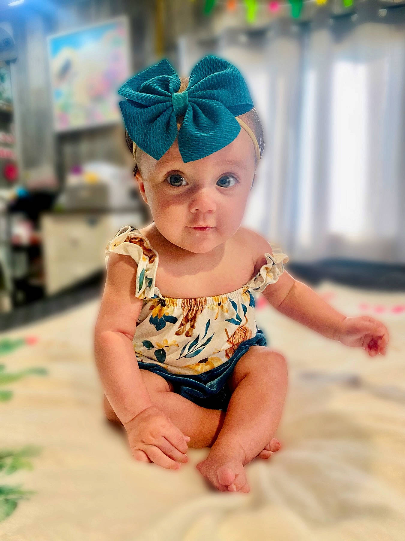 Kinslee is registered to the contest to win money with this photo: abdomen, baby, baby_toddler_clothing, barefoot, child, chin, eye, face, floor, flooring, foot, fun, happy, head, headwear, human_leg, leisure, pattern, person, skin
