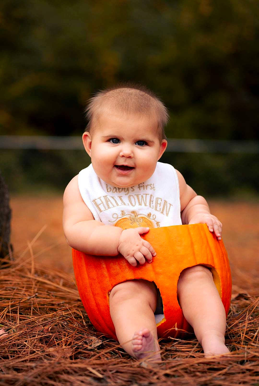 Emilia joined the competition — help win amazing prizes! arm, baby, baby_toddler_clothing, child, chin, flash_photography, fun, grass, happy, human_leg, leisure, people_in_nature, person, plant, sitting, skin, smile, soil, toddler, tree