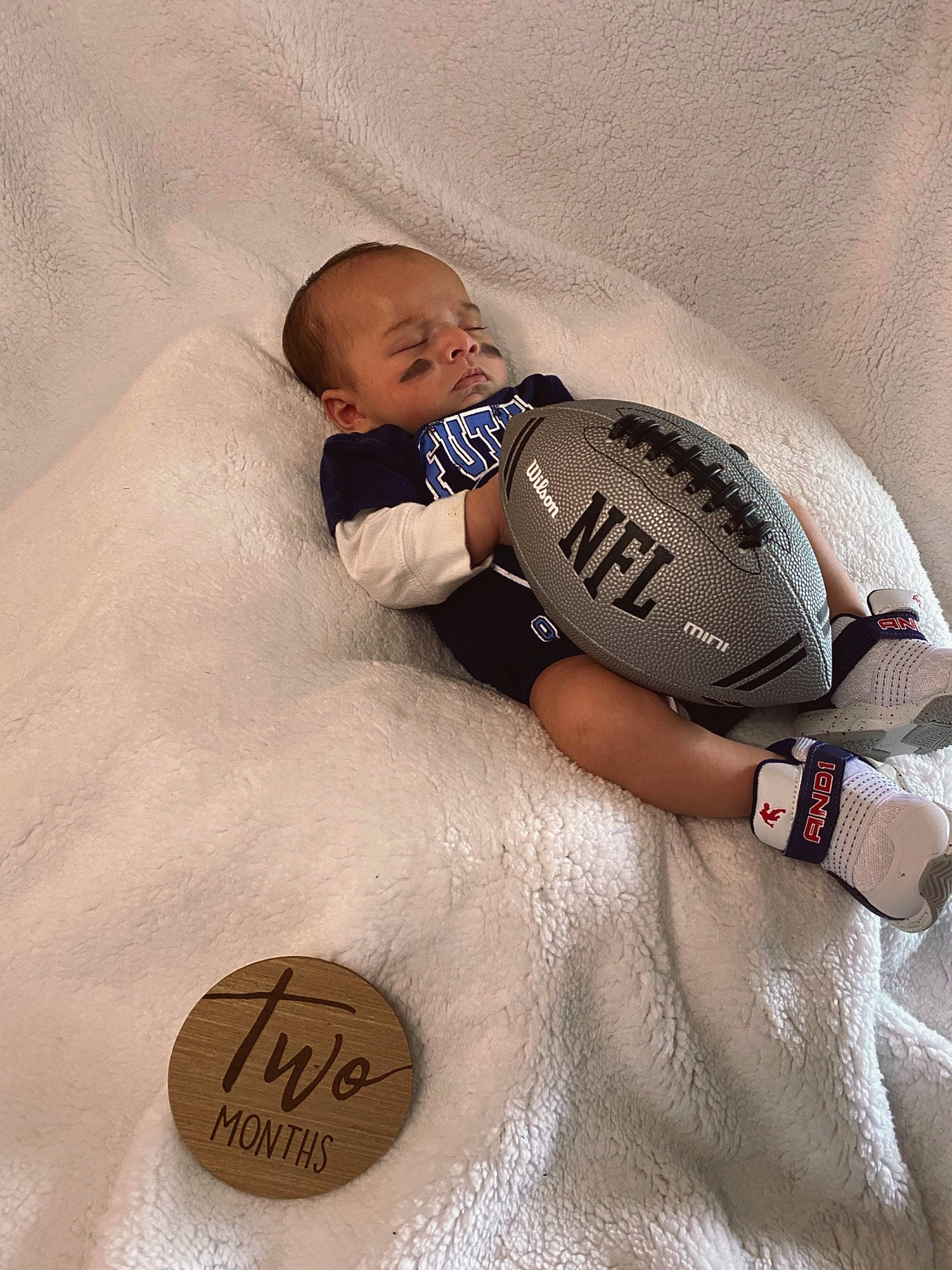 Jalen is registered to the contest to win money with this photo: baby, baby_products, baby_sleeping, baby_toddler_clothing, ball, bedtime, child, comfort, flooring, font, football, fun, happy, linens, person, play, sitting, soccer_ball, sports_equipment, t_shirt