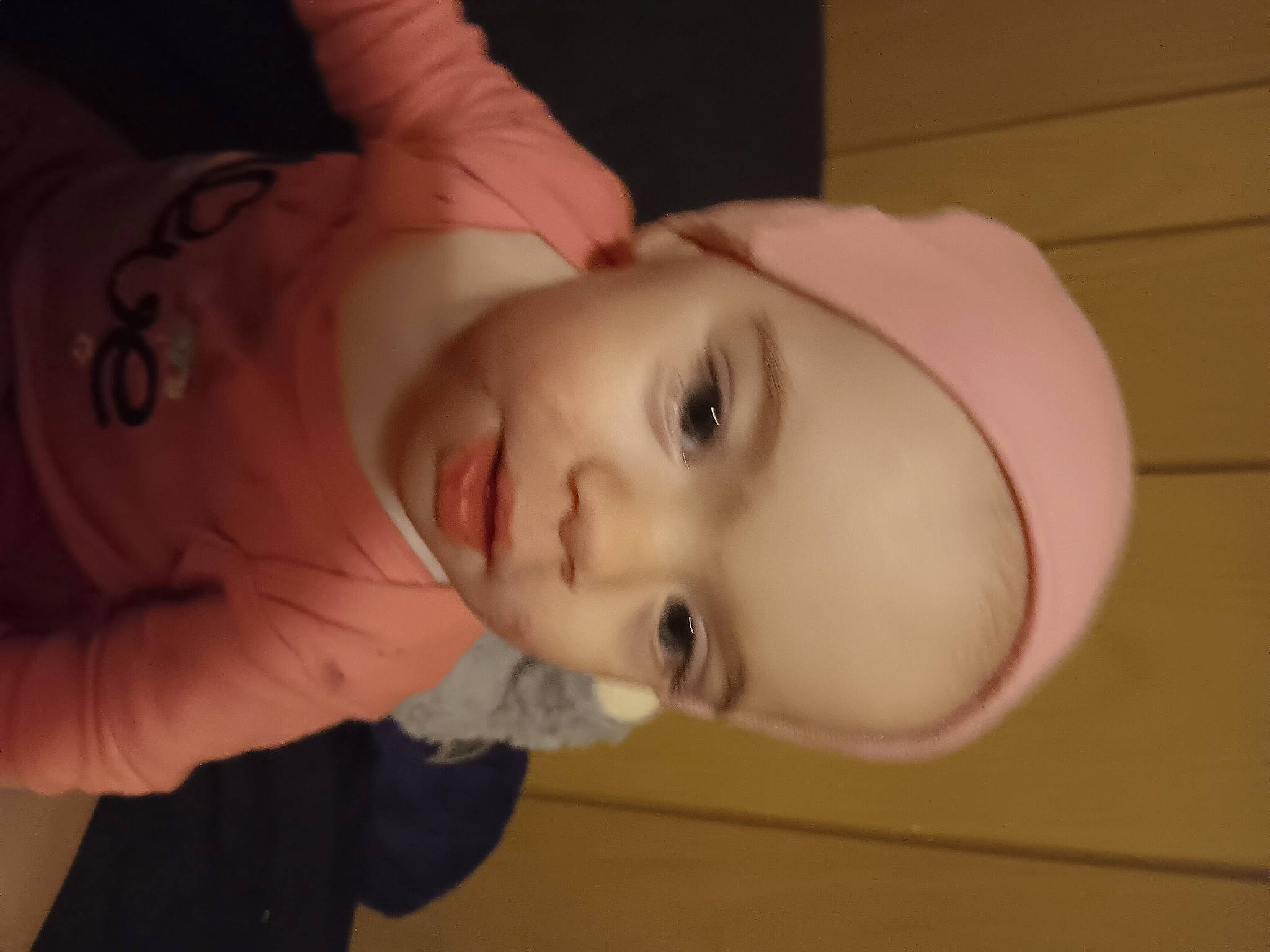 Tara is registered to the contest to win money with this photo: cheek, child, ear, eyebrow, eyelash, flash_photography, forehead, fun, headgear, jaw, lip, mouth, neck, nose, person, portrait_photography, room, sleeve, smile, toddler