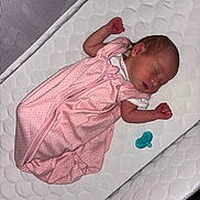 Scarlett joined the competition — help win amazing prizes! newborn, baby, sleeping, infant, pink_sleep_sack, pacifier, crib, mattress, white, quilted, sleepwear, peaceful, child, resting, cute, indoors, young, person, bed, comfort
