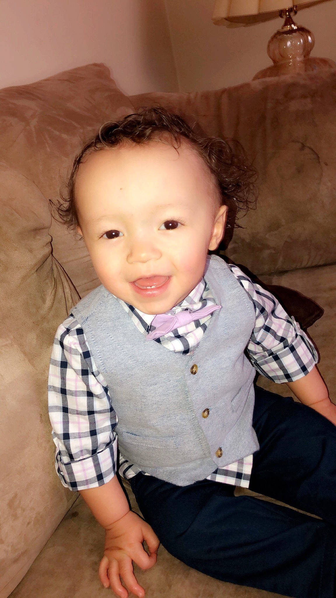 Braylon is registered to the contest to win money with this photo: baby, cheek, child, child_model, chin, face, head, pattern, person, plaid, sitting, skin, toddler