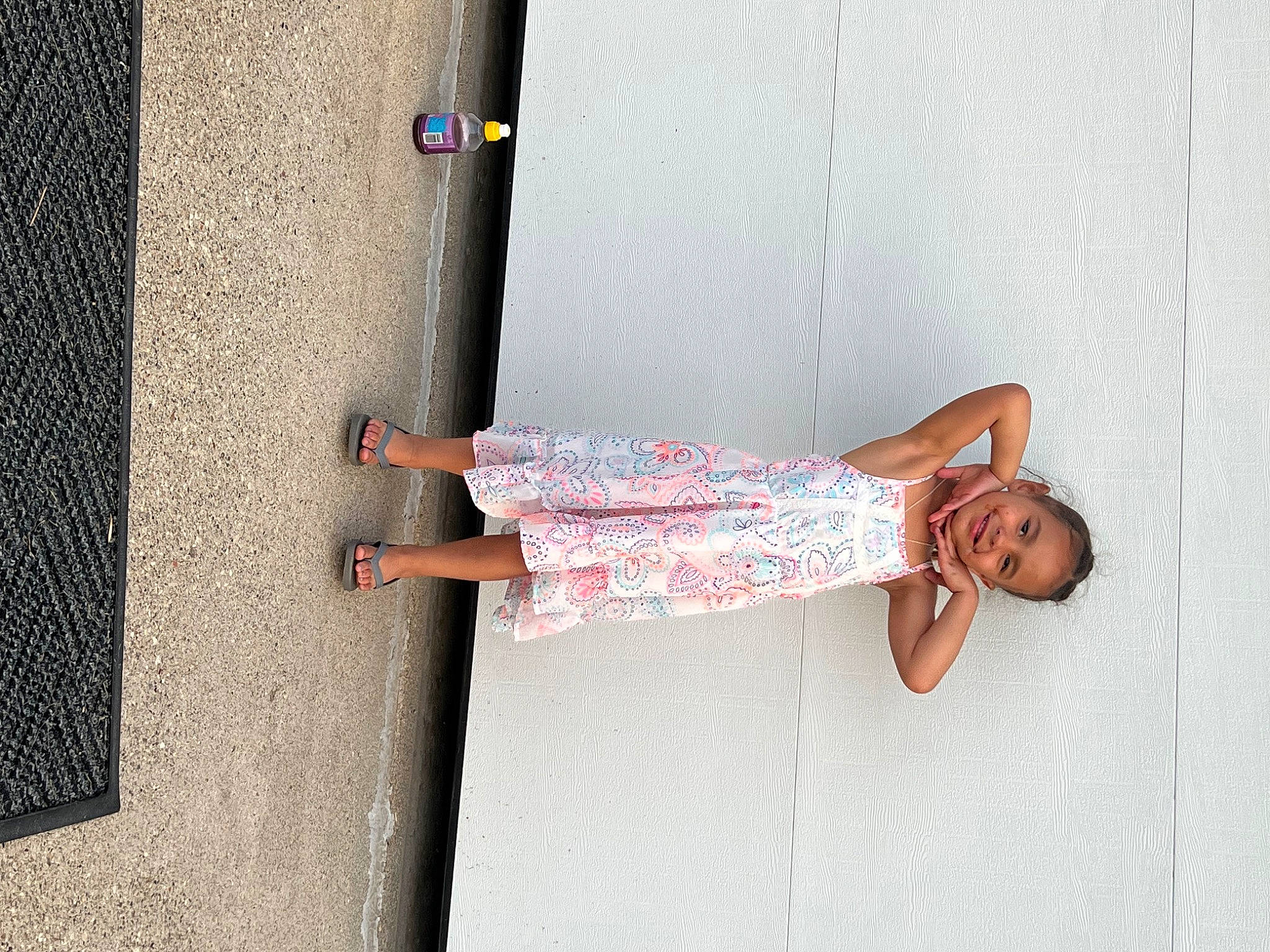 Braelyn joined the competition — help win amazing prizes! child, concrete, day_dress, dress, eyewear, foot, human_leg, joy, knee, leisure, magenta, pattern, person, sandal, shadow, sidewalk, sitting, sunglasses, textile, thigh