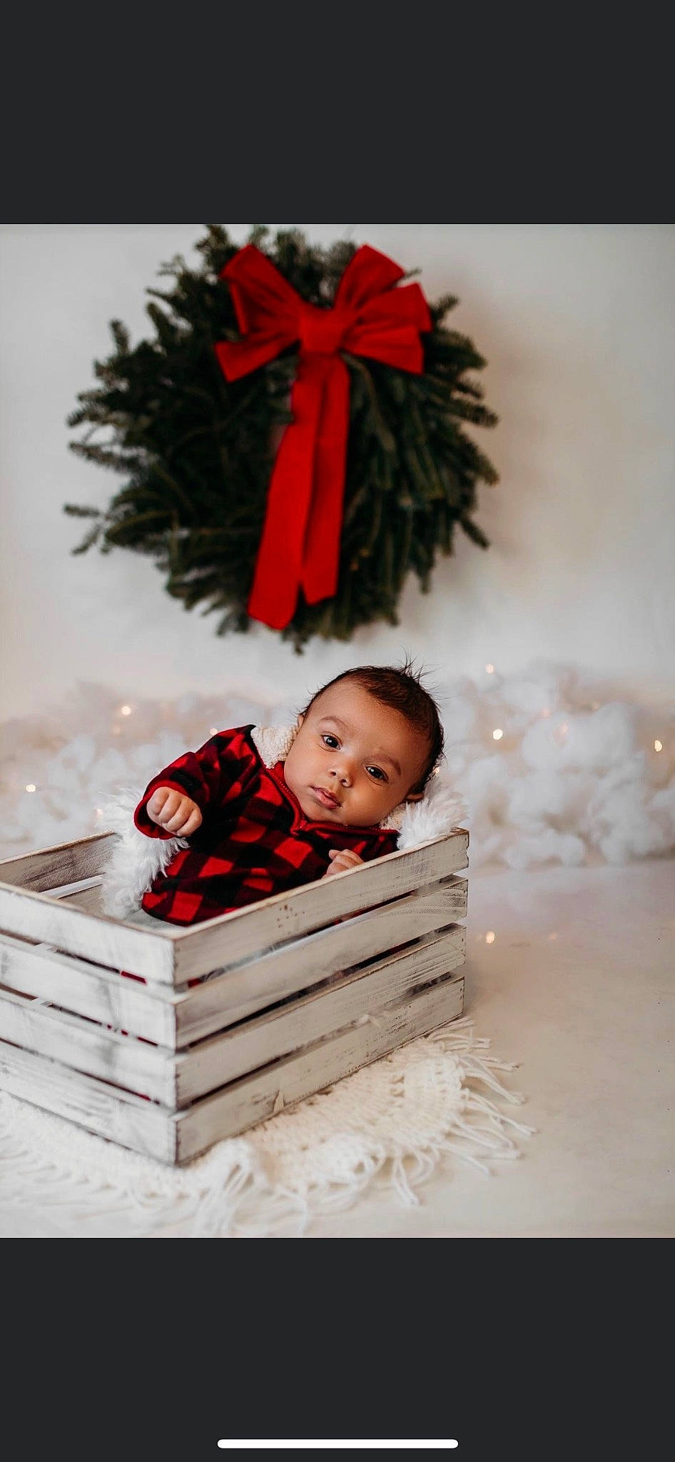 Dedrick is registered to the contest to win money with this photo: baby, carmine, christmas, christmas_decoration, christmas_ornament, conifer, event, evergreen, fashion_accessory, flash_photography, hair, happy, holiday, human_body, ornament, person, toddler, tree, twig, winter