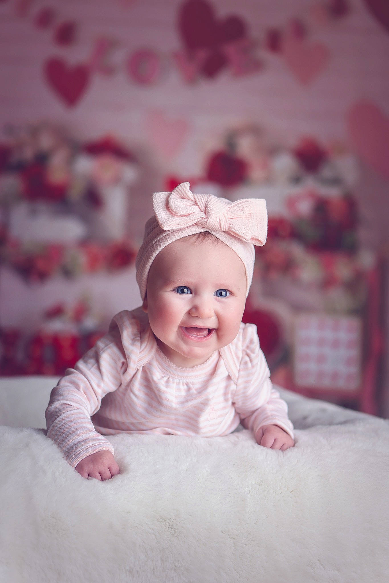 Makenzie joined the competition — help win amazing prizes! baby, baby_toddler_clothing, cap, child, facial_expression, fashion_accessory, flash_photography, hair_accessory, happy, hat, headpiece, headwear, joy, magenta, monochrome_photography, person, petal, pink, portrait_photography, sitting