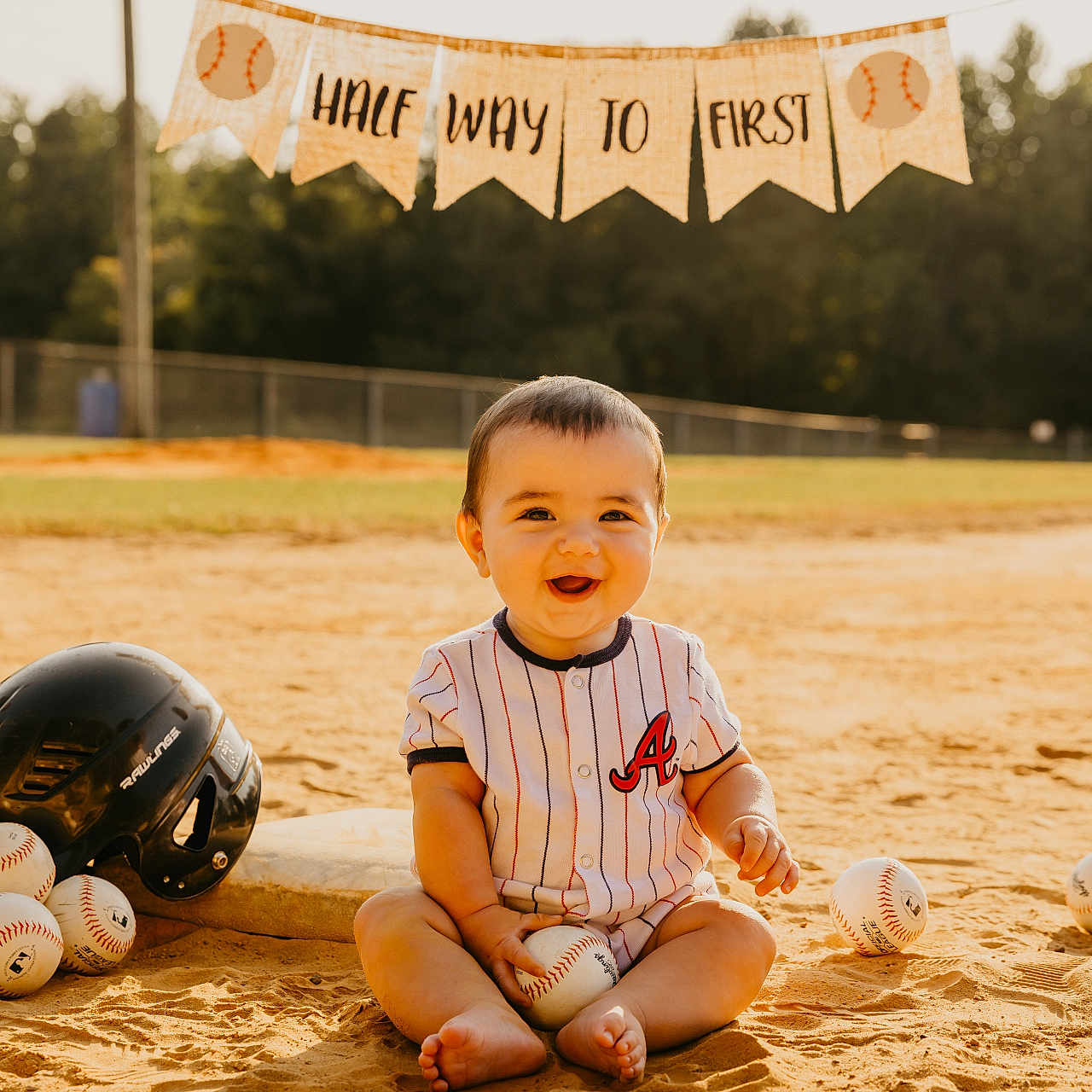 Parker is registered to the contest to win money with this photo: baby, ball, baseball, baseballball, baseballglove, clothing, face, football, glove, happy, head, helmet, people, person, photography, portrait, soccer, soccerball, sphere, sport
