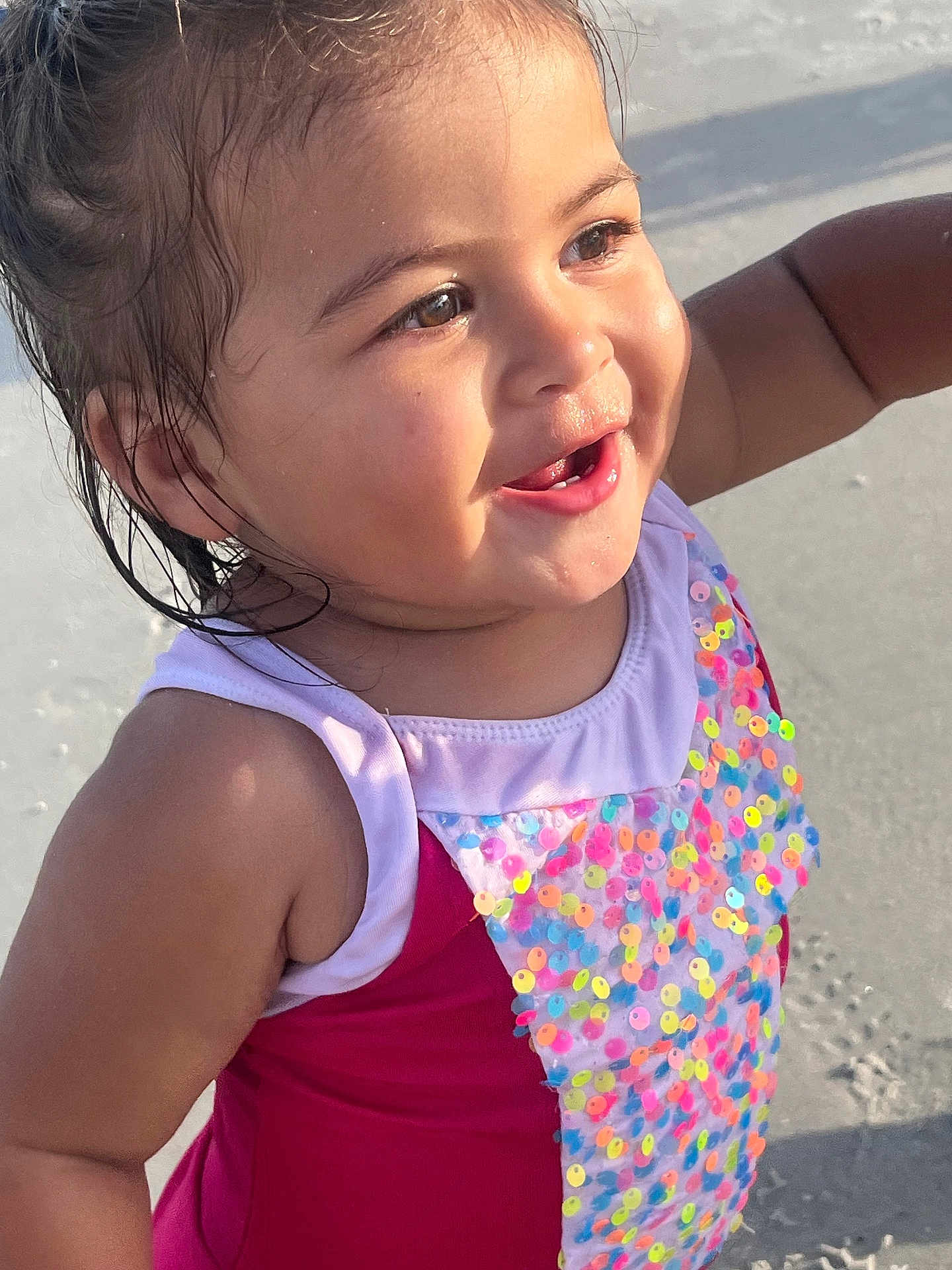 Ana joined the competition — help win amazing prizes! toddler, child, smiling, swimsuit, sequins, beach, sand, sunlight, wet_hair, happy, portrait, outdoor, cute, face, skin, arms, summer, vacation, playful, joyful