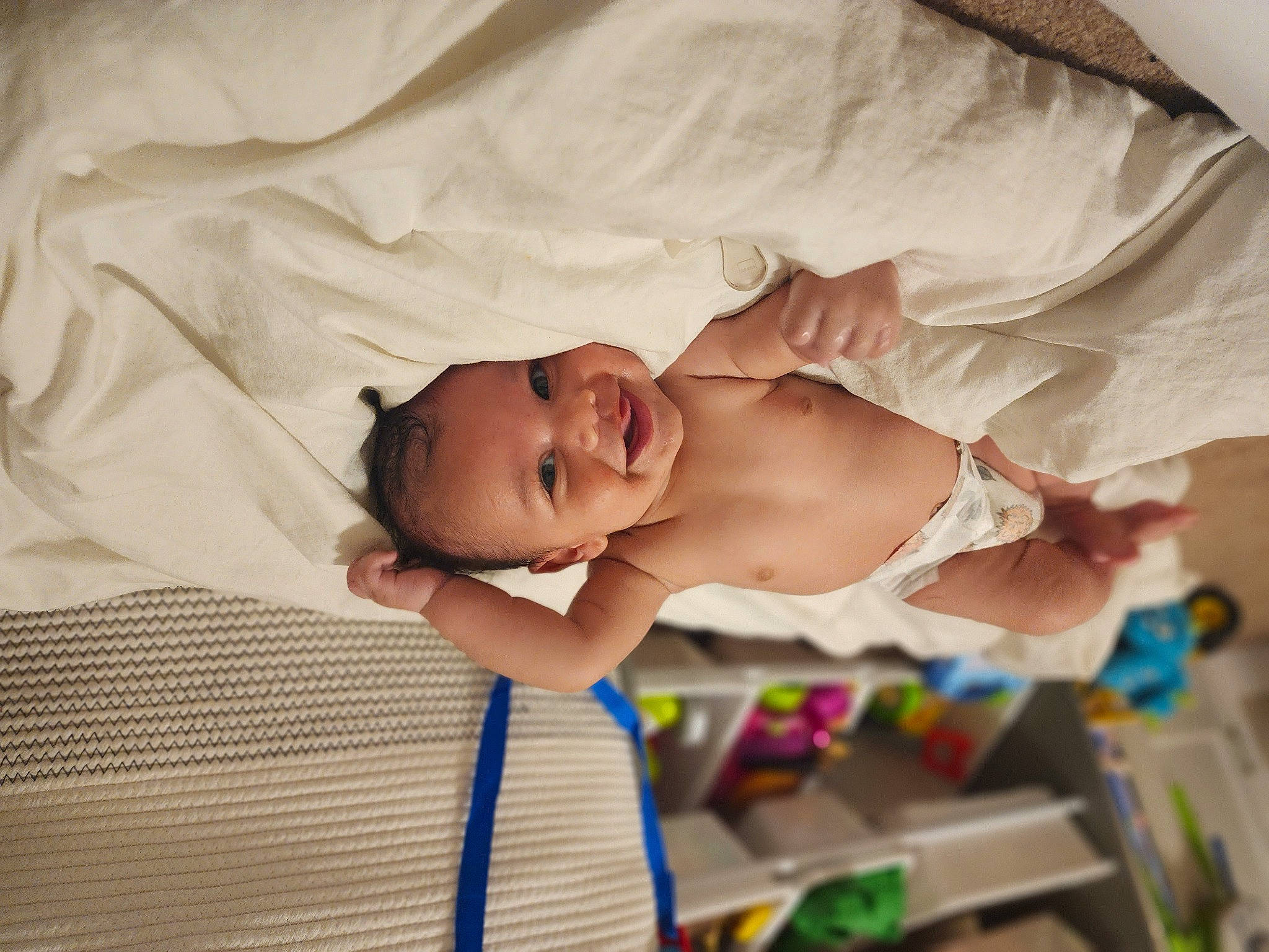 Declan joined the competition — help win amazing prizes! baby, baby_products, baby_safety, baby_toddler_clothing, bedding, bedtime, child, comfort, happy, linens, pattern, person, portrait_photography, room, skin, sleep, smile, toddler