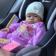 Cimani joined the competition — help win amazing prizes! baby, car_seat, child, clothing, hat, knit_hat, purple_outfit, winnie_the_pooh, tigger, toddler, seatbelt, indoor, portrait, cute, child_seat, infant, face, person, pout, soft_light