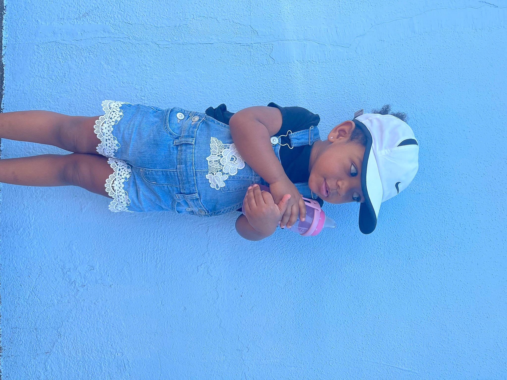 Amina joined the competition — help win amazing prizes! azure, baby, baby_toddler_clothing, child, elbow, electric_blue, flooring, fun, headgear, headwear, human_body, human_leg, knee, leisure, mammal, pattern, person, sleeve, t_shirt, thigh