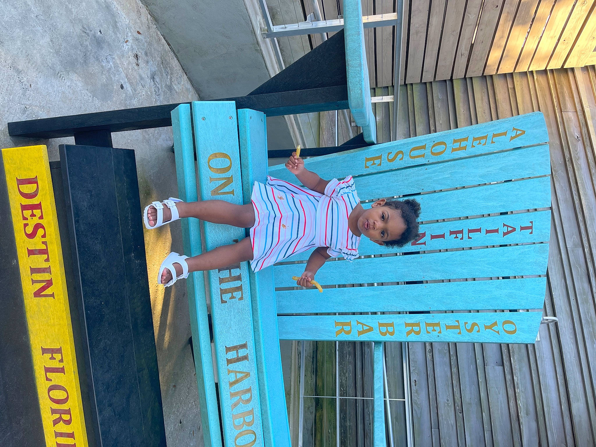 Amina joined the competition — help win amazing prizes! azure, child, electric_blue, facade, fun, hardwood, house, leisure, metal, person, recreation, shorts, smile, t_shirt, toddler, transport, travel, wall, wood, wood_stain