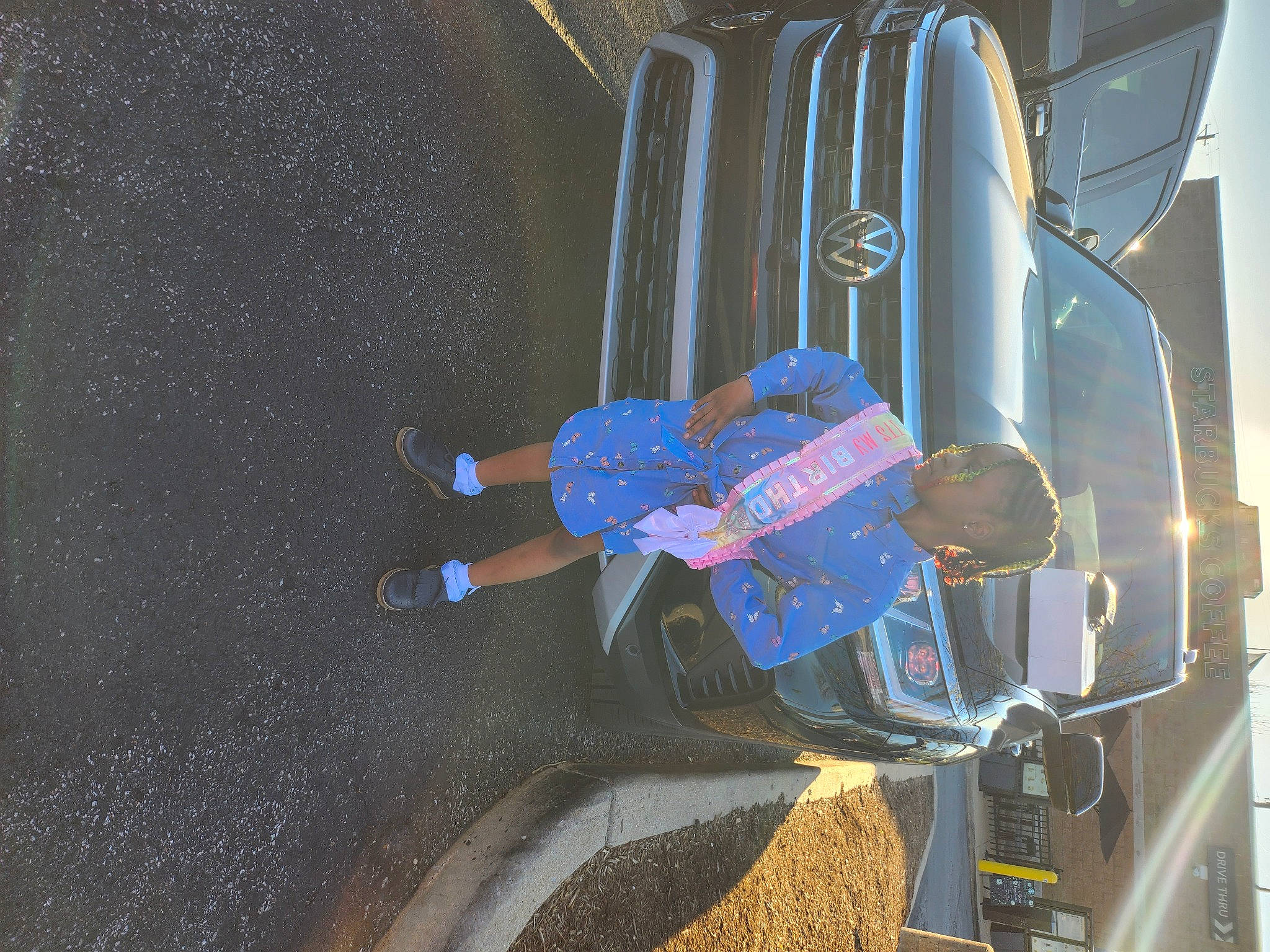 Seven joined the competition — help win amazing prizes! asphalt, automotive_design, automotive_exterior, automotive_lighting, automotive_tail_brake_light, automotive_tire, automotive_wheel_system, bumper, car, electric_blue, fender, gas, hood, motor_vehicle, person, tire, trunk, vehicle, vehicle_door, wheel