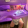 Oakley is registered to the contest to win money with this photo: baby, child, curious, play_structure, purple, onesie, indoor, floor, crawling, hands, knees, expression, lighting, grip, toy, plastic, cute, face, eyes, infant