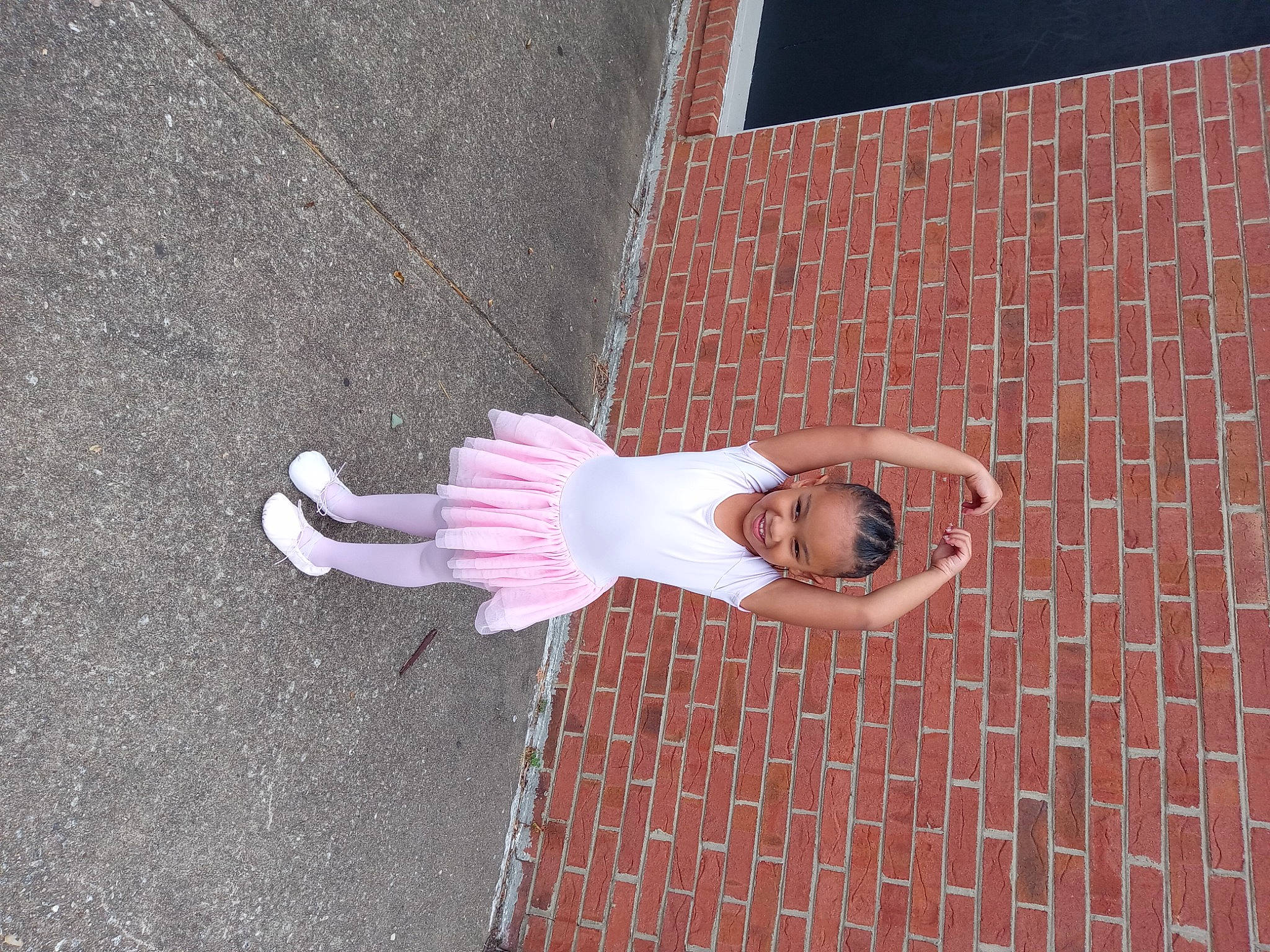 Arie joined the competition — help win amazing prizes! asphalt, brick, brickwork, concrete, facade, fashion_accessory, joy, linens, magenta, pattern, person, pink, road_surface, shadow, sidewalk, smile, toy, tree, visual_arts, wood