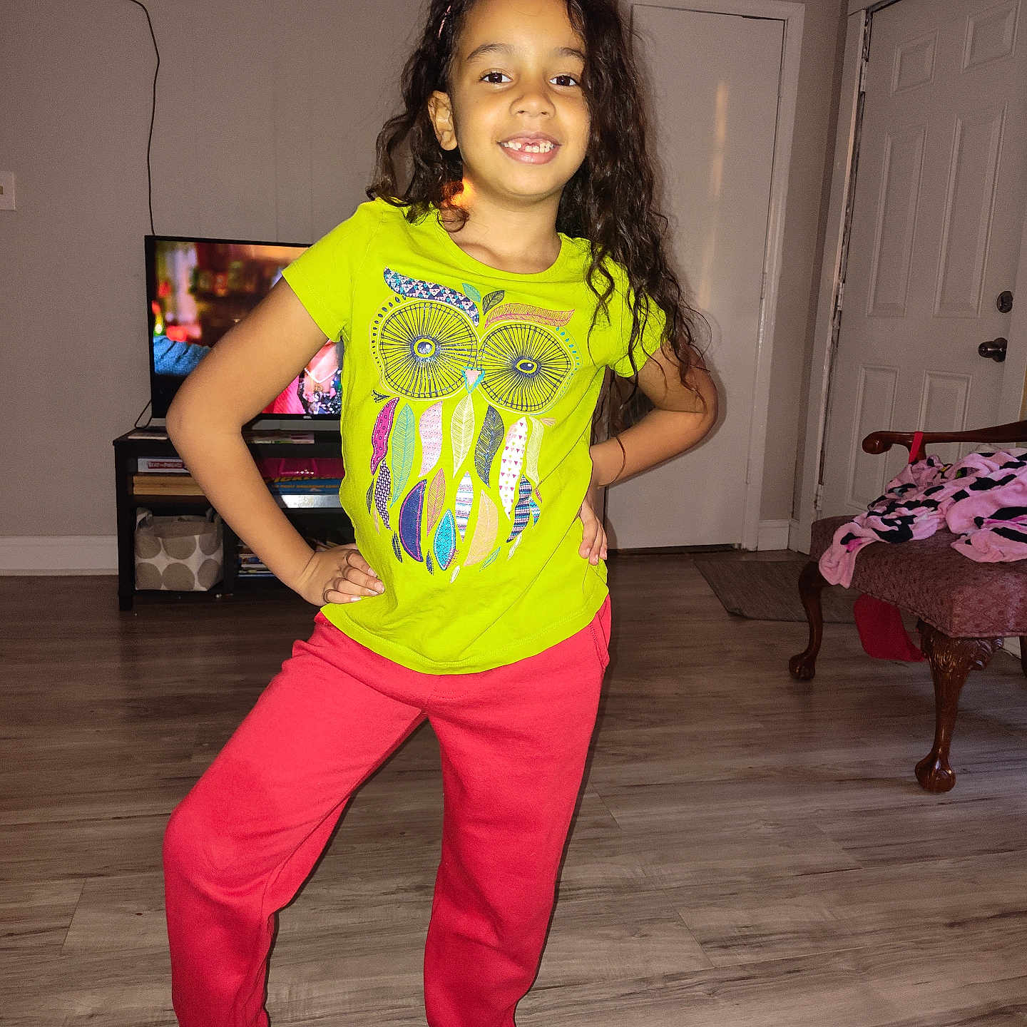 Moriah joined the competition — help win amazing prizes! chair, child, clothing, computerhardware, electronics, female, footwear, girl, hardware, hardwood, indoors, interiordesign, monitor, pants, person, screen, shoe, t_shirt, tv, wood