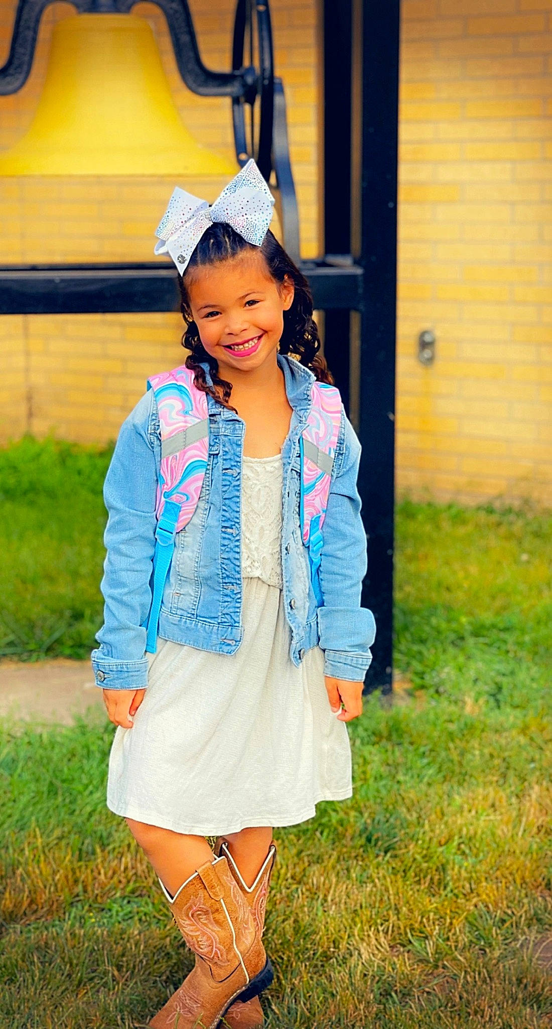 Paityn is registered to the contest to win money with this photo: child, electric_blue, event, fashion_accessory, fashion_design, formal_wear, fun, grass, happy, human_leg, jewellery, joy, magenta, outerwear, pattern, person, sleeve, smile, thigh, toddler