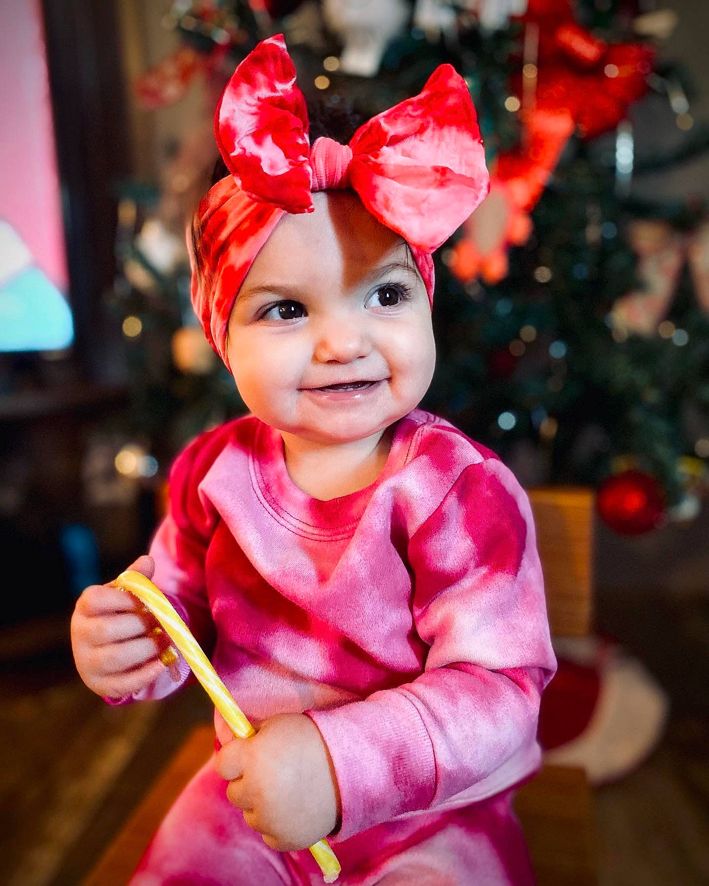 Kinsleigh is registered to the contest to win money with this photo: baby_toddler_clothing, child, costume, costume_hat, event, eye, fashion_accessory, fictional_character, fun, happy, hat, head, headpiece, headwear, holiday, human_body, joy, magenta, party_supply, person