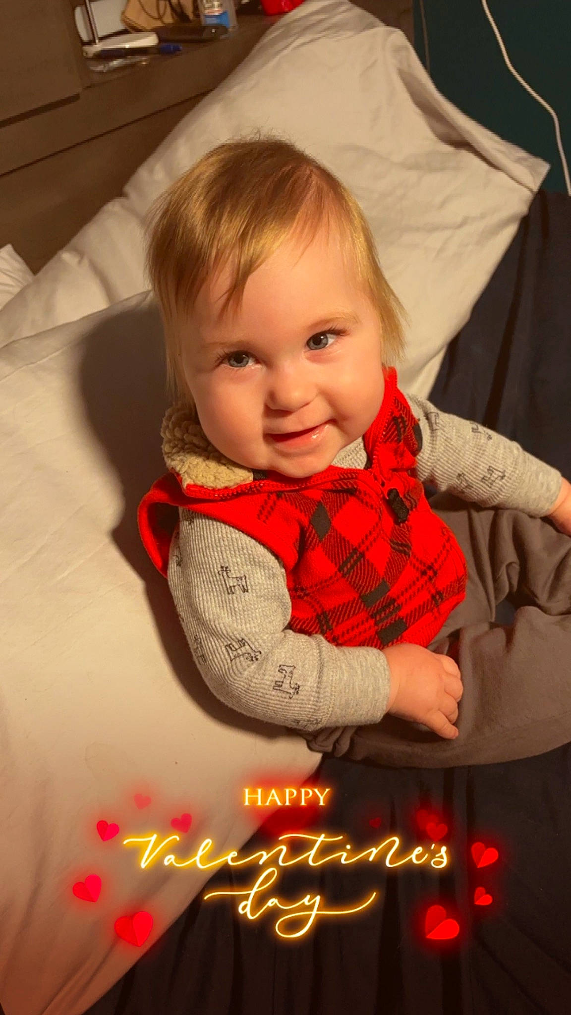 Huxley joined the competition — help win amazing prizes! baby, baby_products, baby_toddler_clothing, carmine, child, christmas, comfort, couch, event, flooring, happy, joy, linens, pattern, person, plaid, sitting, sleeve, smile, t_shirt