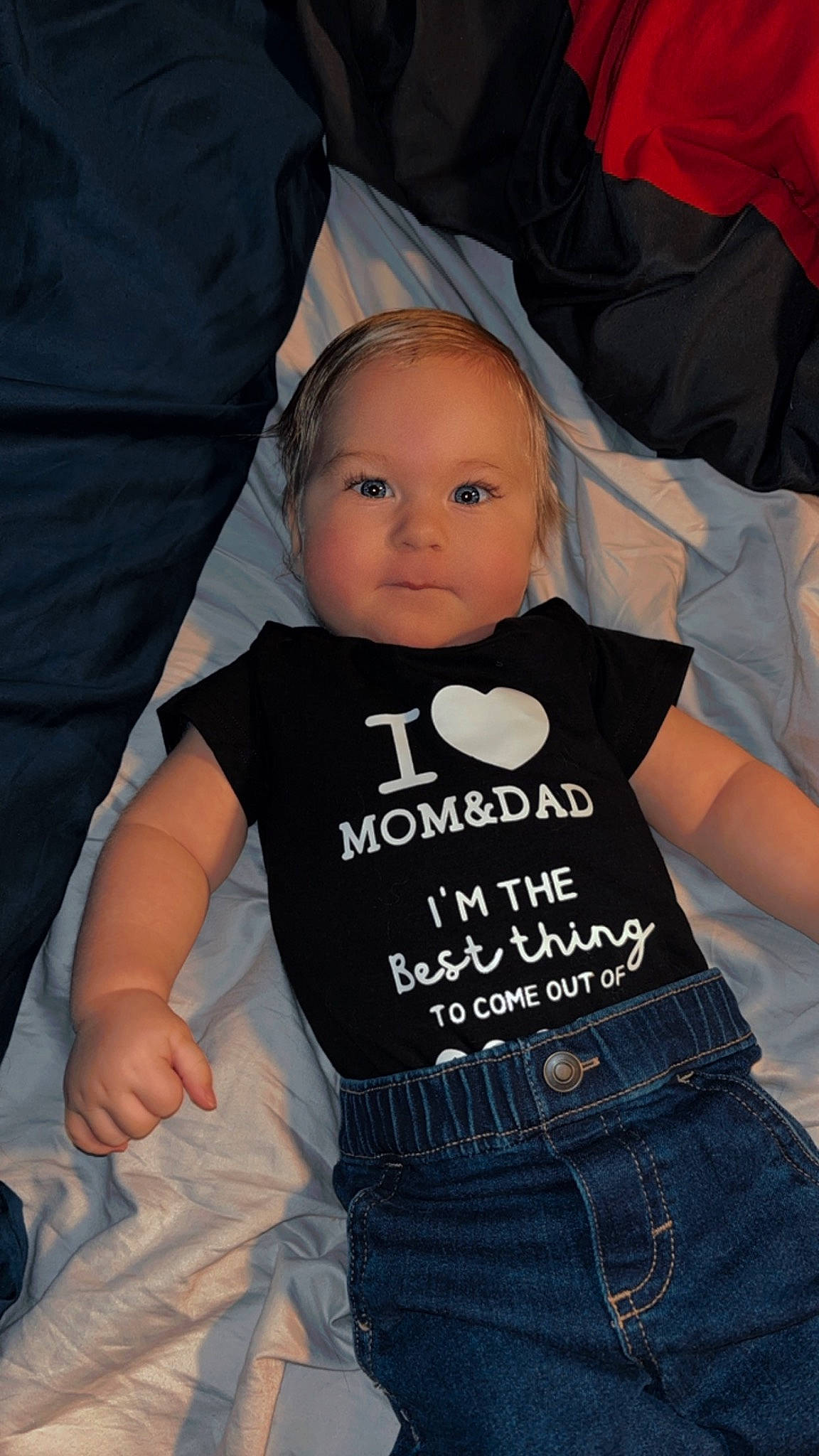 Huxley joined the competition — help win amazing prizes! baby, baby_carriage, baby_products, baby_toddler_clothing, belt, black, child, comfort, cool, denim, eye, hairstyle, pattern, person, shorts, sitting, sleeve, t_shirt, textile, toddler