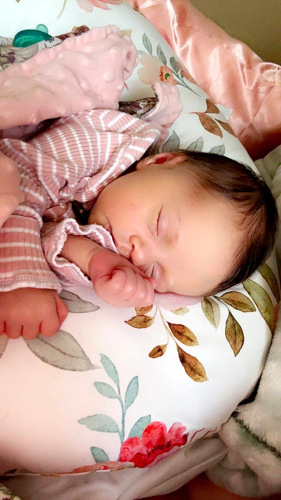 Eliza joined the competition — help win amazing prizes! baby, sleeping, pillow, blanket, pink, striped_clothing, infant, peaceful, closeup, face, hand, soft_texture, floral_pattern, cozy, indoors, resting, cute, newborn, child, comfort
