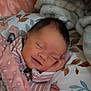 Eliza is registered to the contest to win money with this photo: baby, sleeping, blanket, pink, pillow, floral, newborn, peaceful, cozy, soft, infant, child, resting, cute, face, hand, bedroom, comfort, portrait, indoors